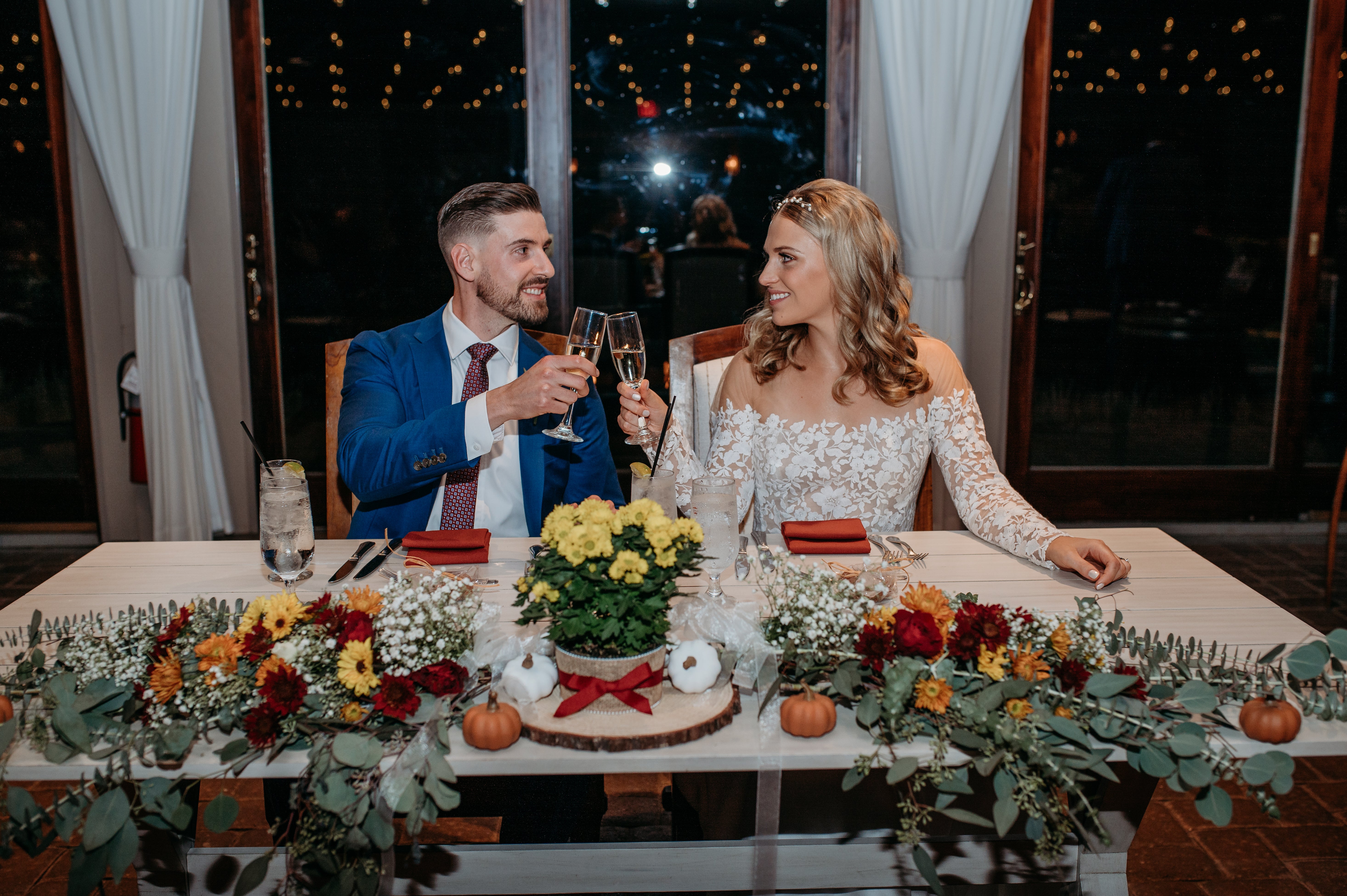 Bride and groom cheersing during their Ballyowen Bailigh Bluff House wedding reception.