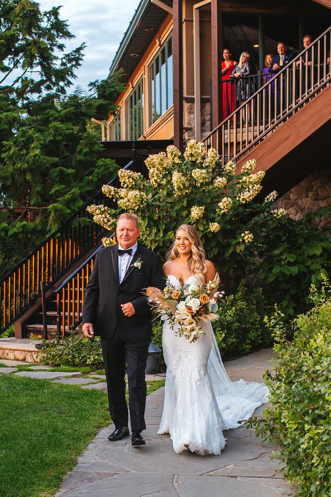 Bride walking down the aisle at Wedding Garden ceremony space at Crystal Springs Country Club. 