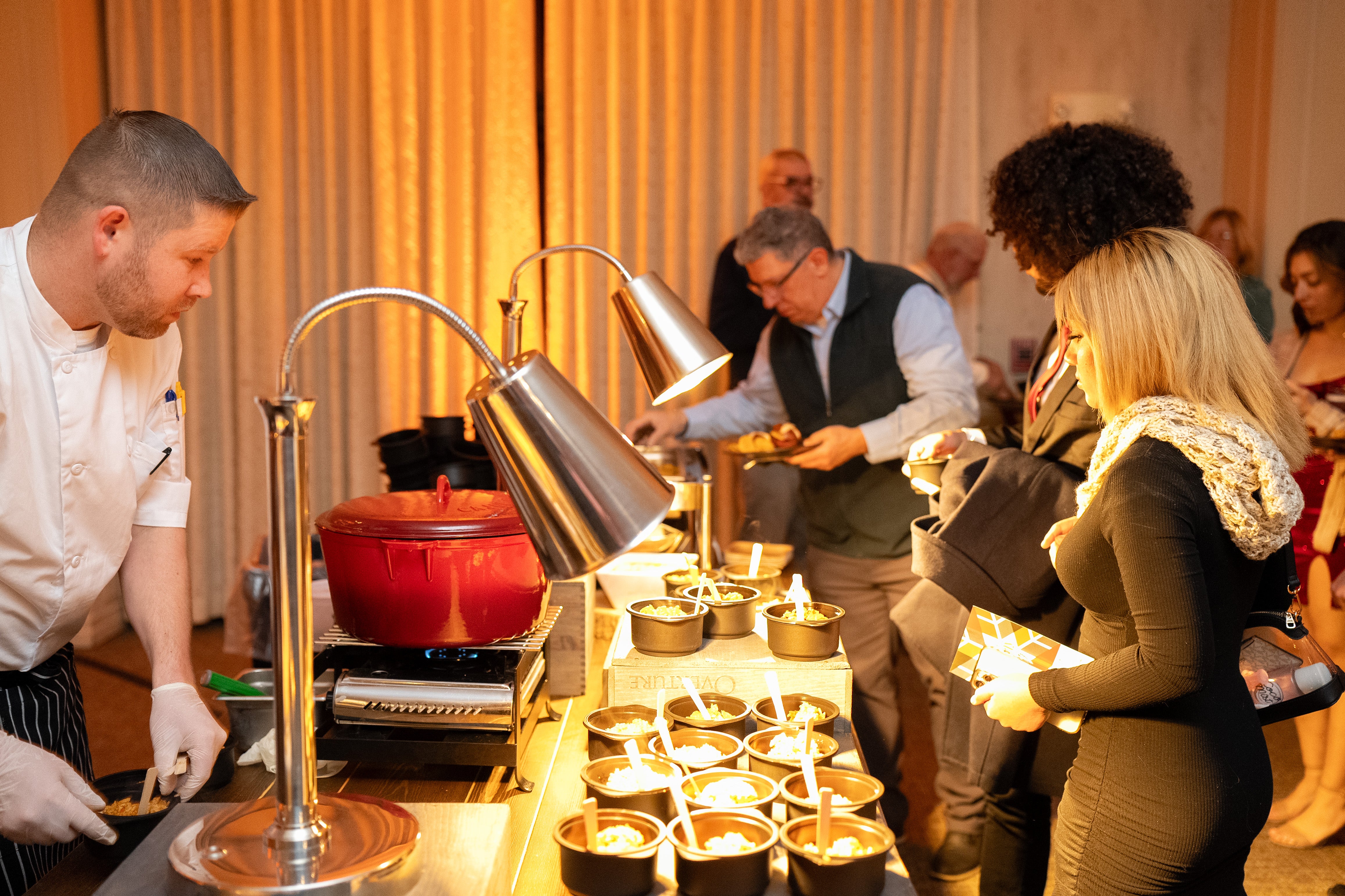 Chef's serving food in Diamond Cocktail Room. 