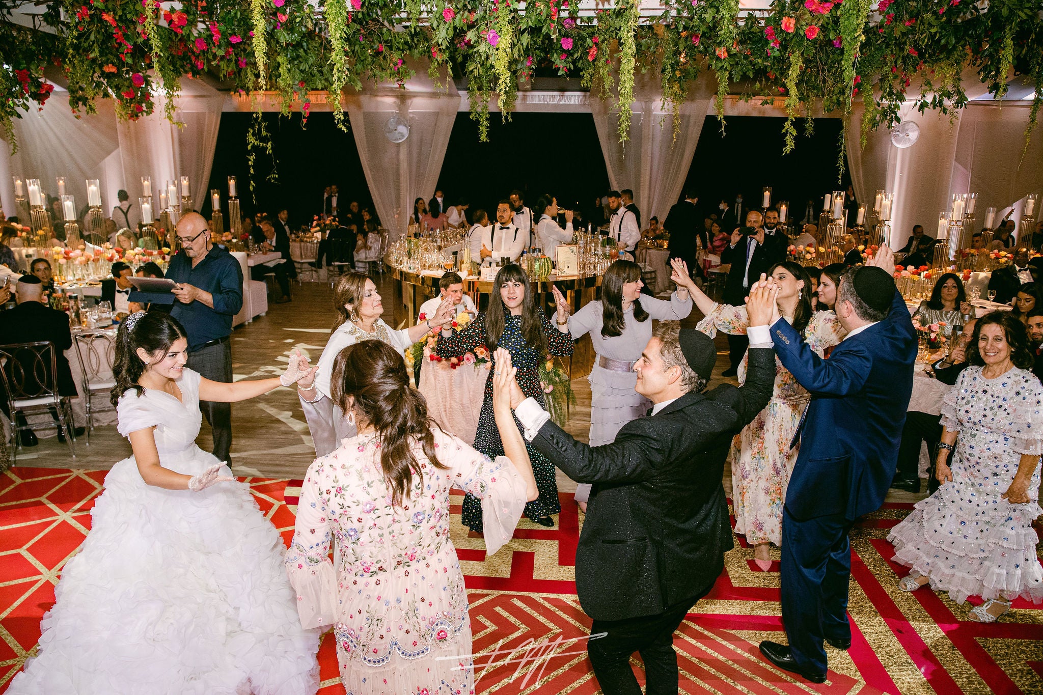 Guests dancing during wedding reception at Big Sky Pavillion.
