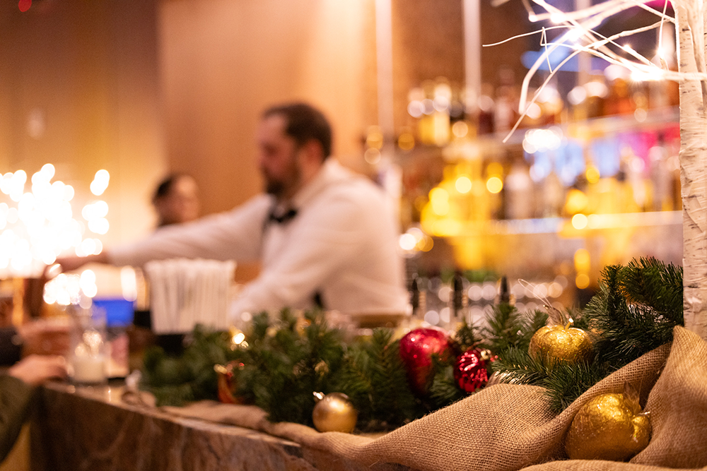 Bartender tending to customers during event in Canyon Ballroom