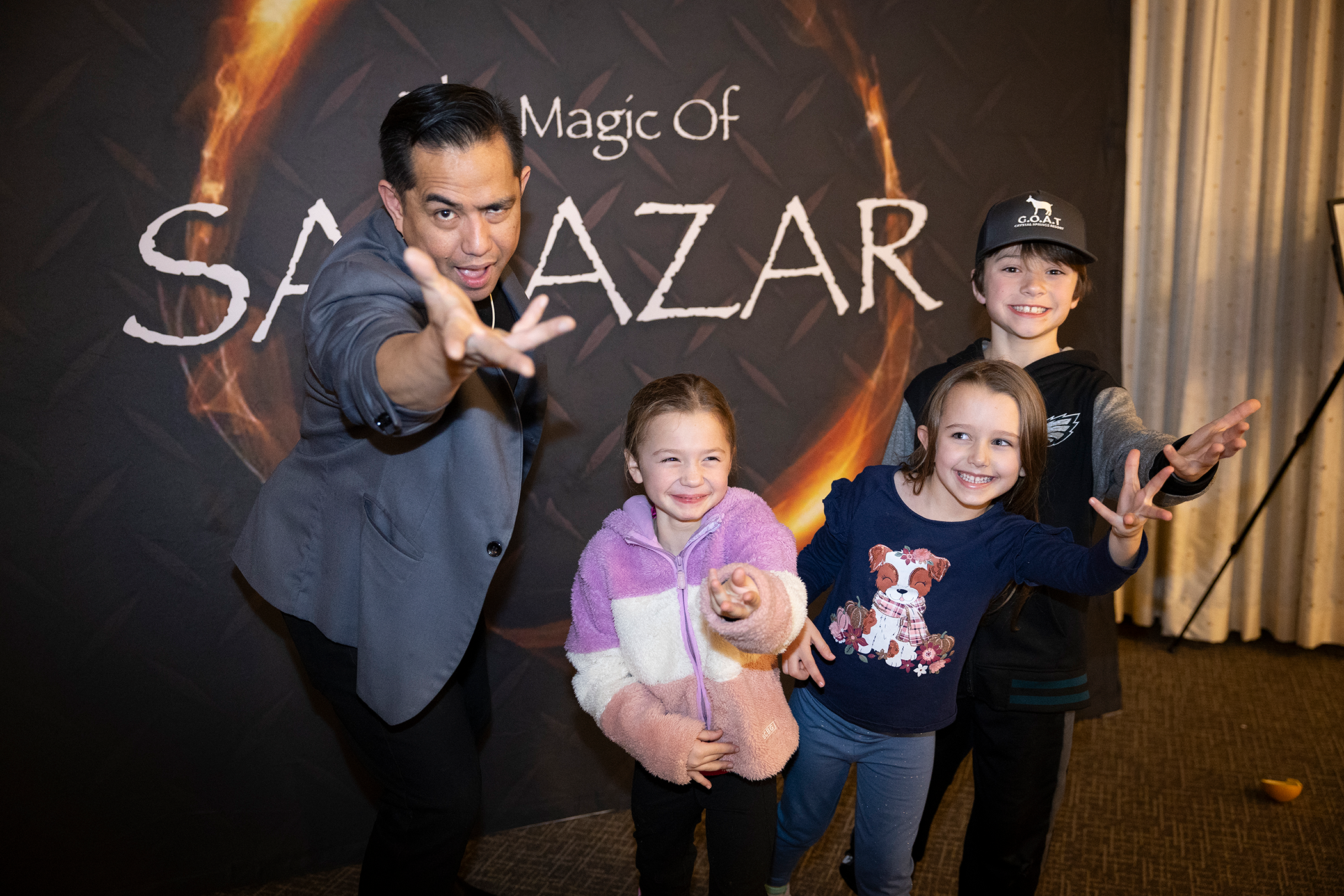 Anthony Salazar posing with show goers. 