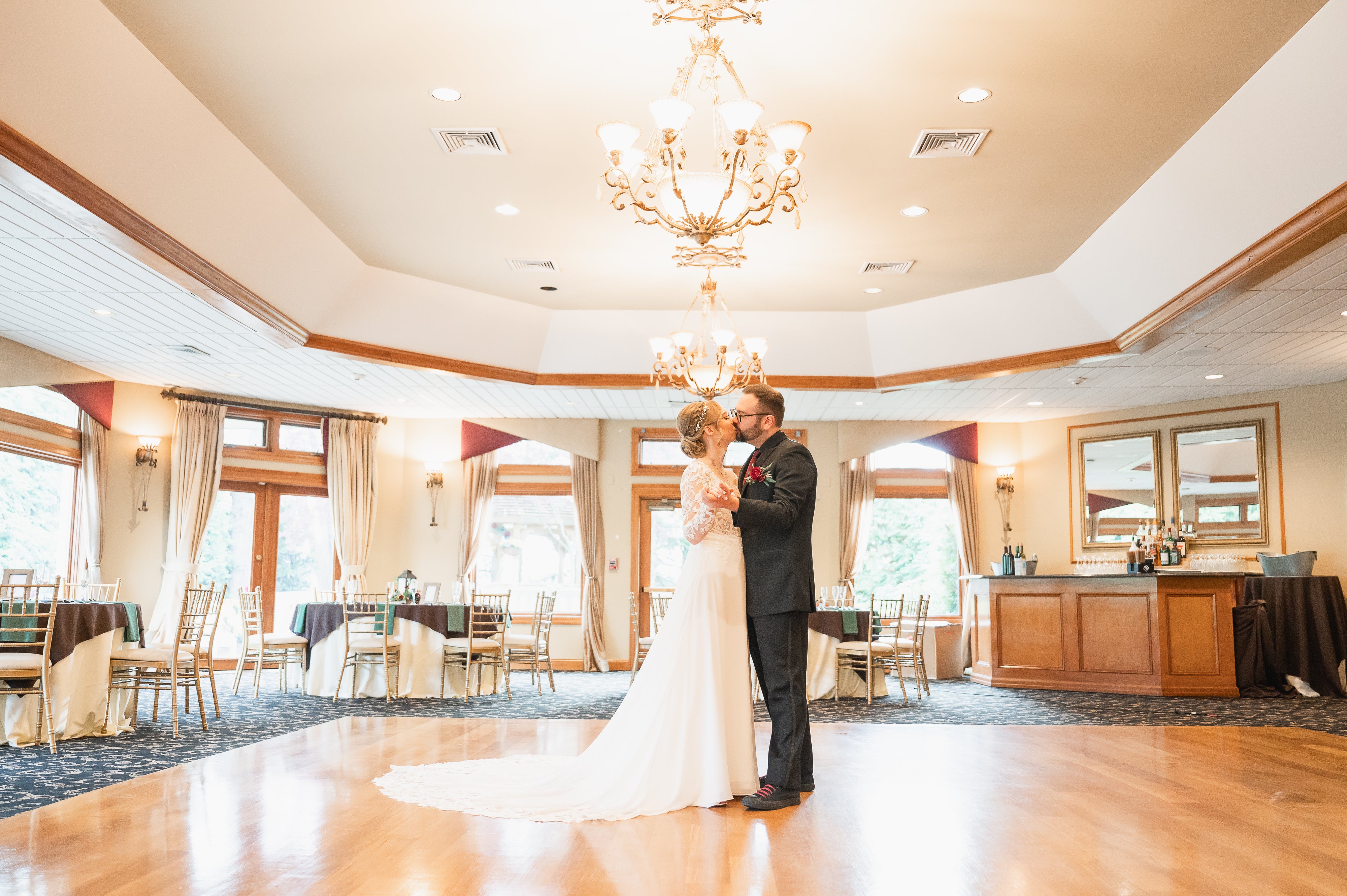 Bride and groom kiss on the dance floor at Black Bear wedding.