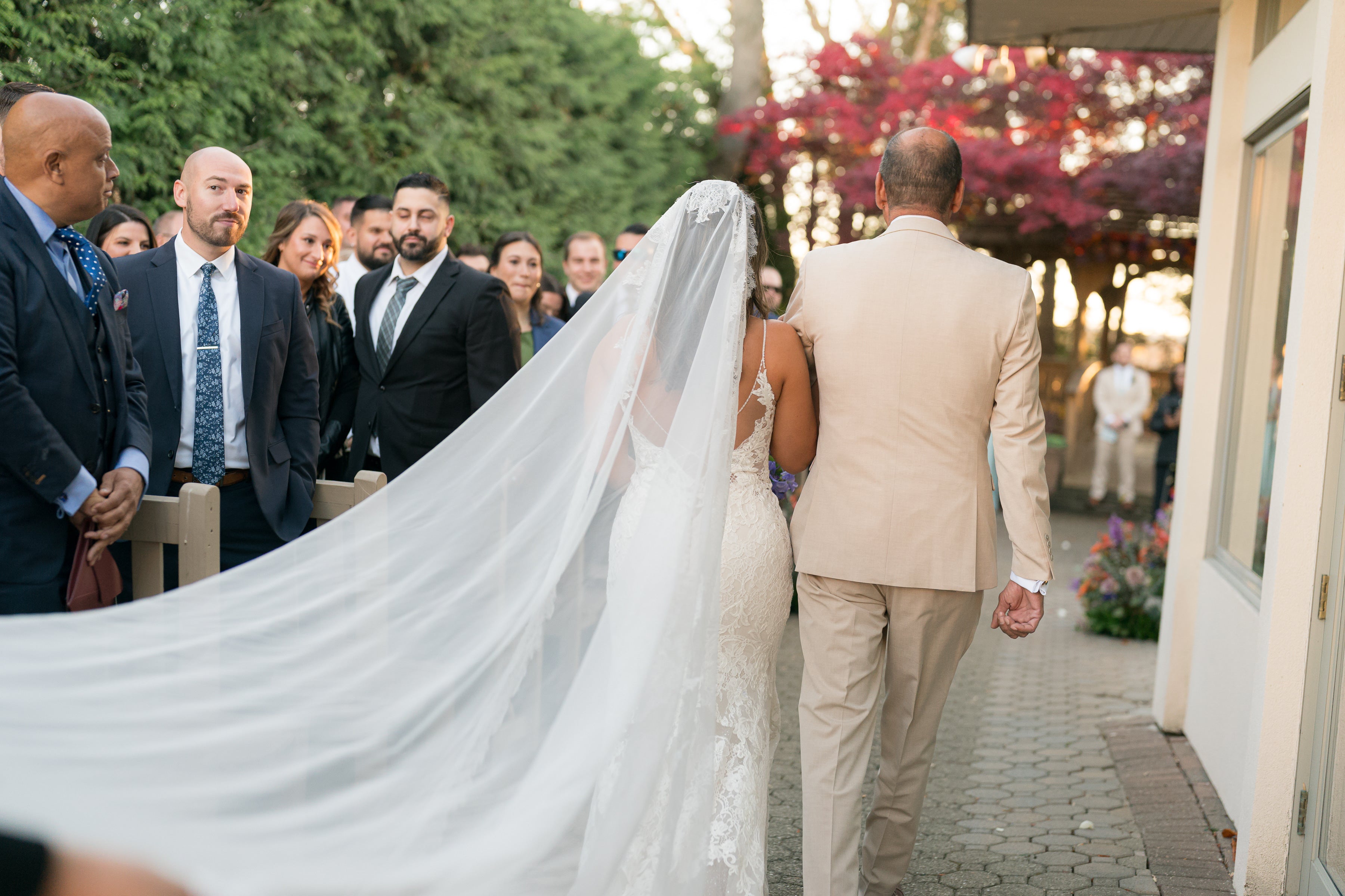 Man and bride walk down aisle at Black Bear wedding ceremony. 
