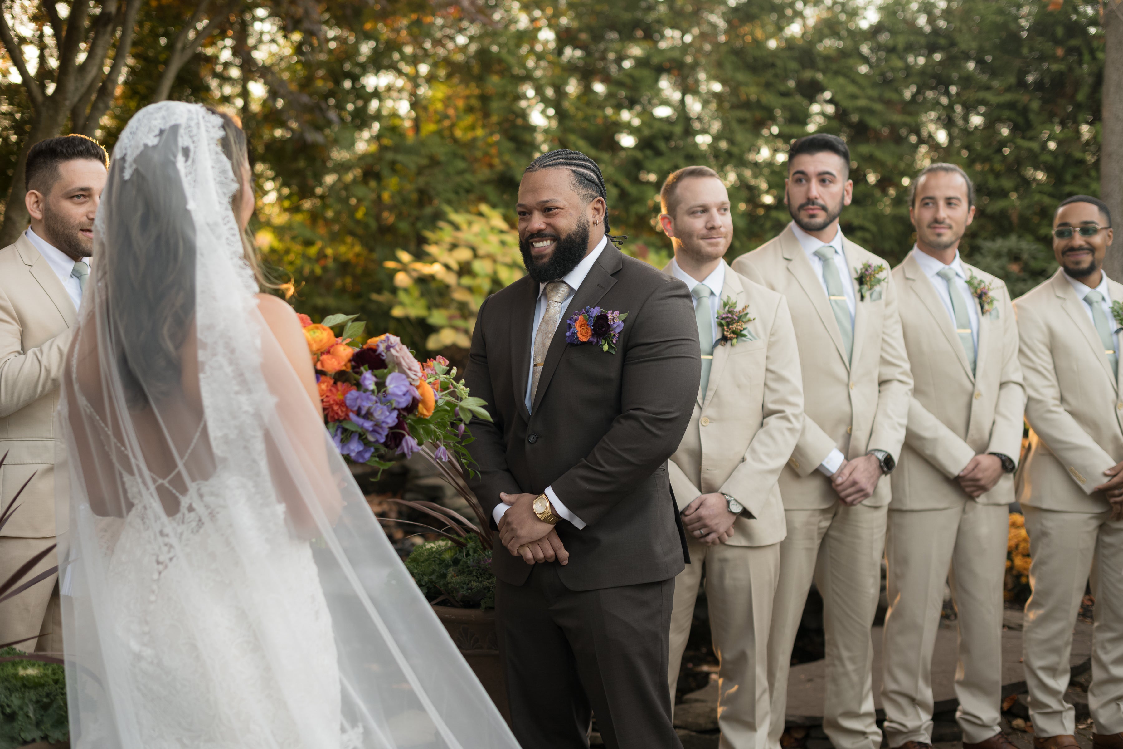 Groom and bride stand together at altar at Black Bear wedding ceremony.