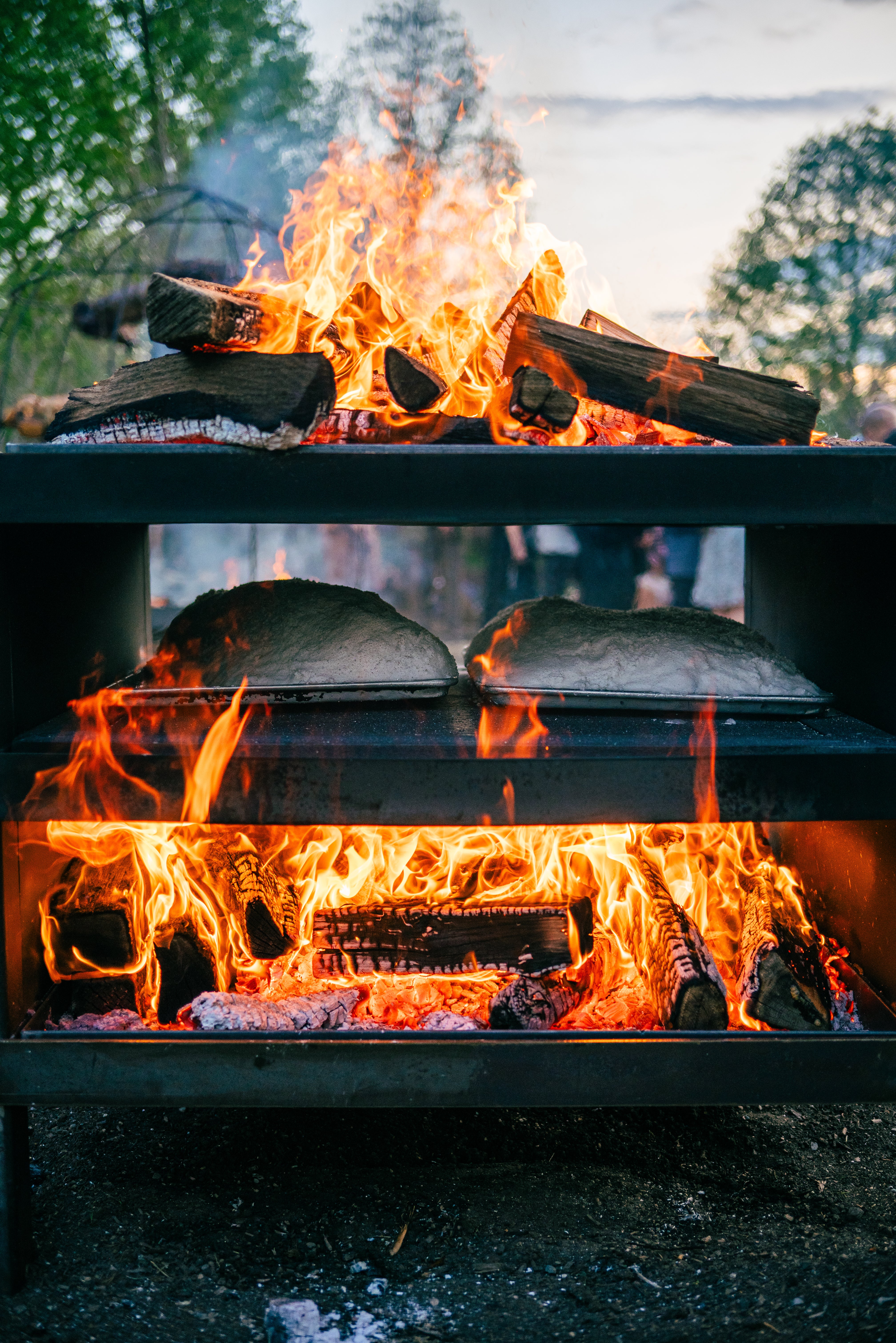 Food being prepper in wood fired stove. 
