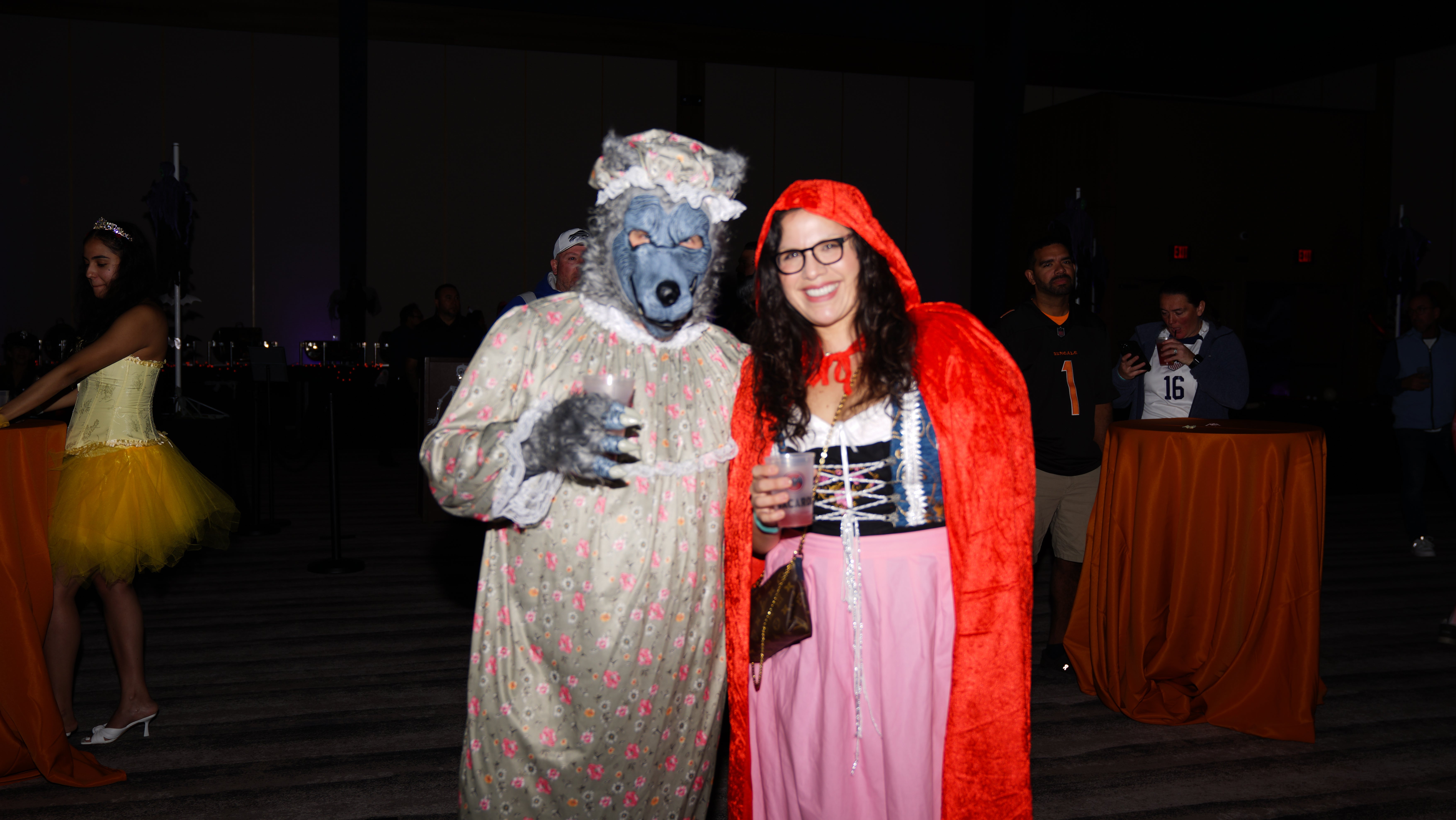 Couple dressed up as wolf and little red riding hood
