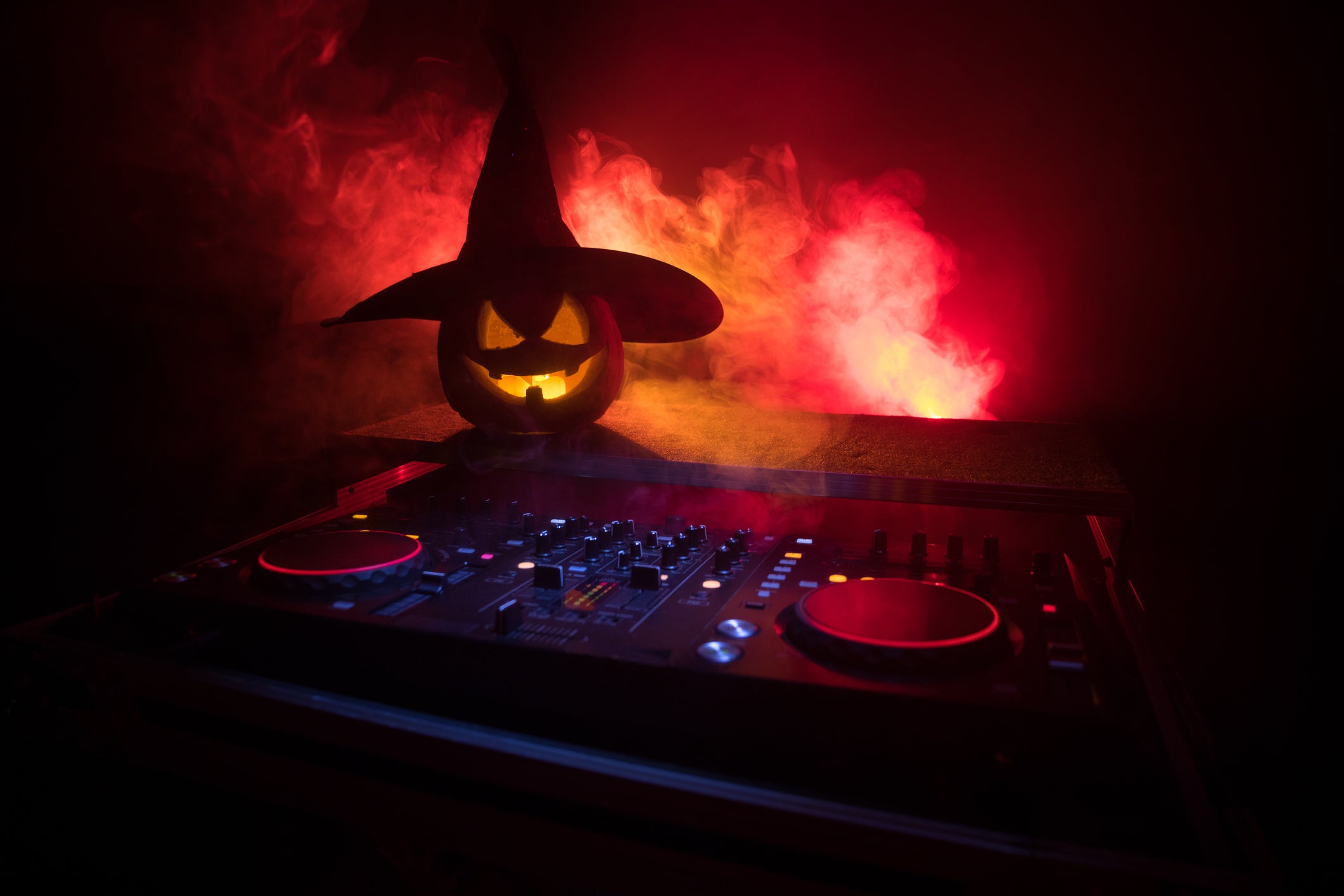 Spooky pumpkin on DJ table