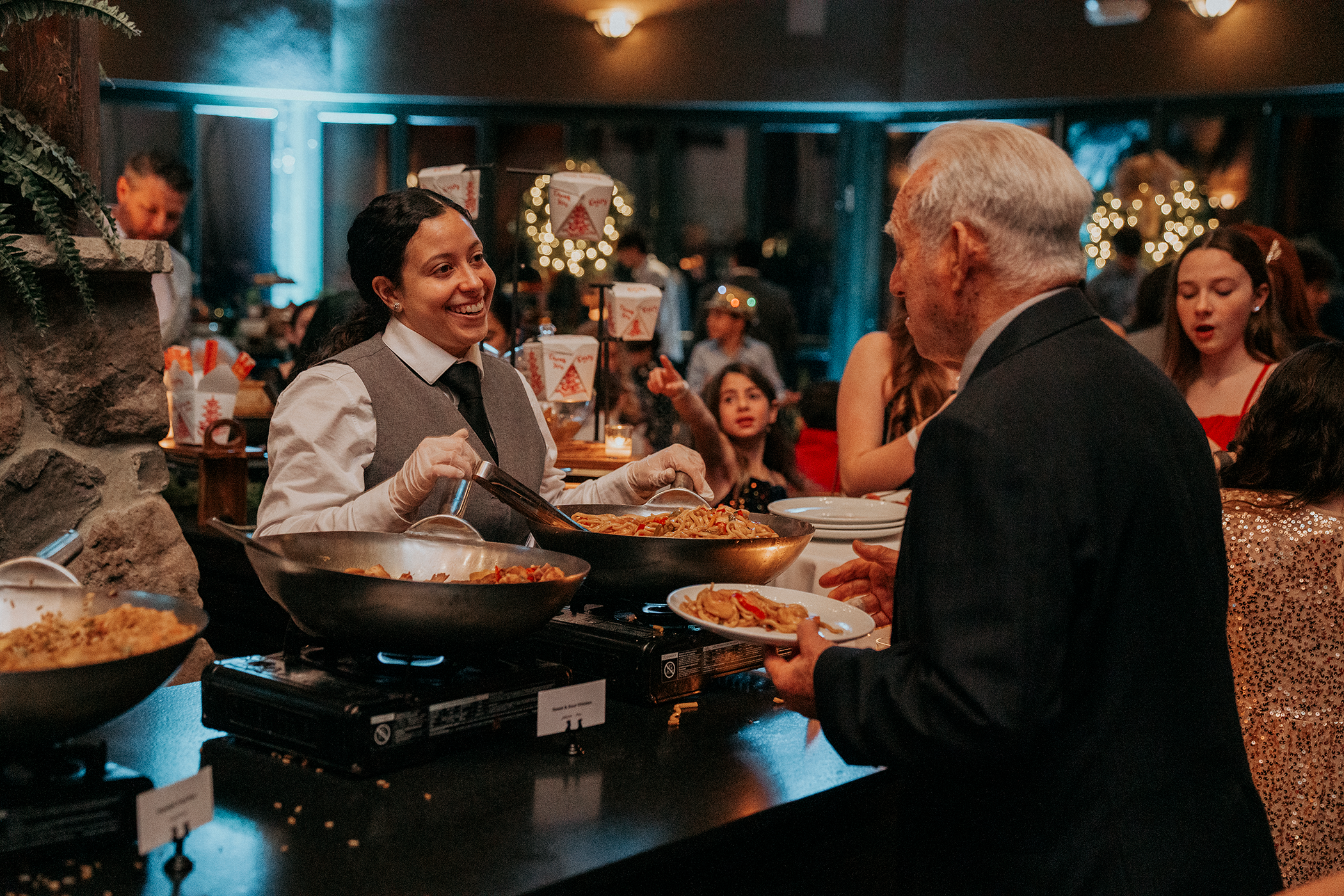 Man getting food from buffet in Grand Rotunda. 