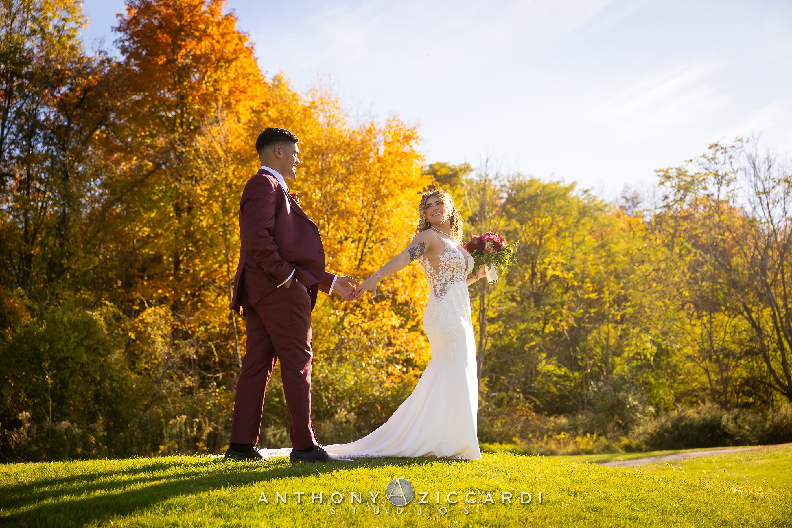 Bride and groom at Minerals Hotel during fall wedding.