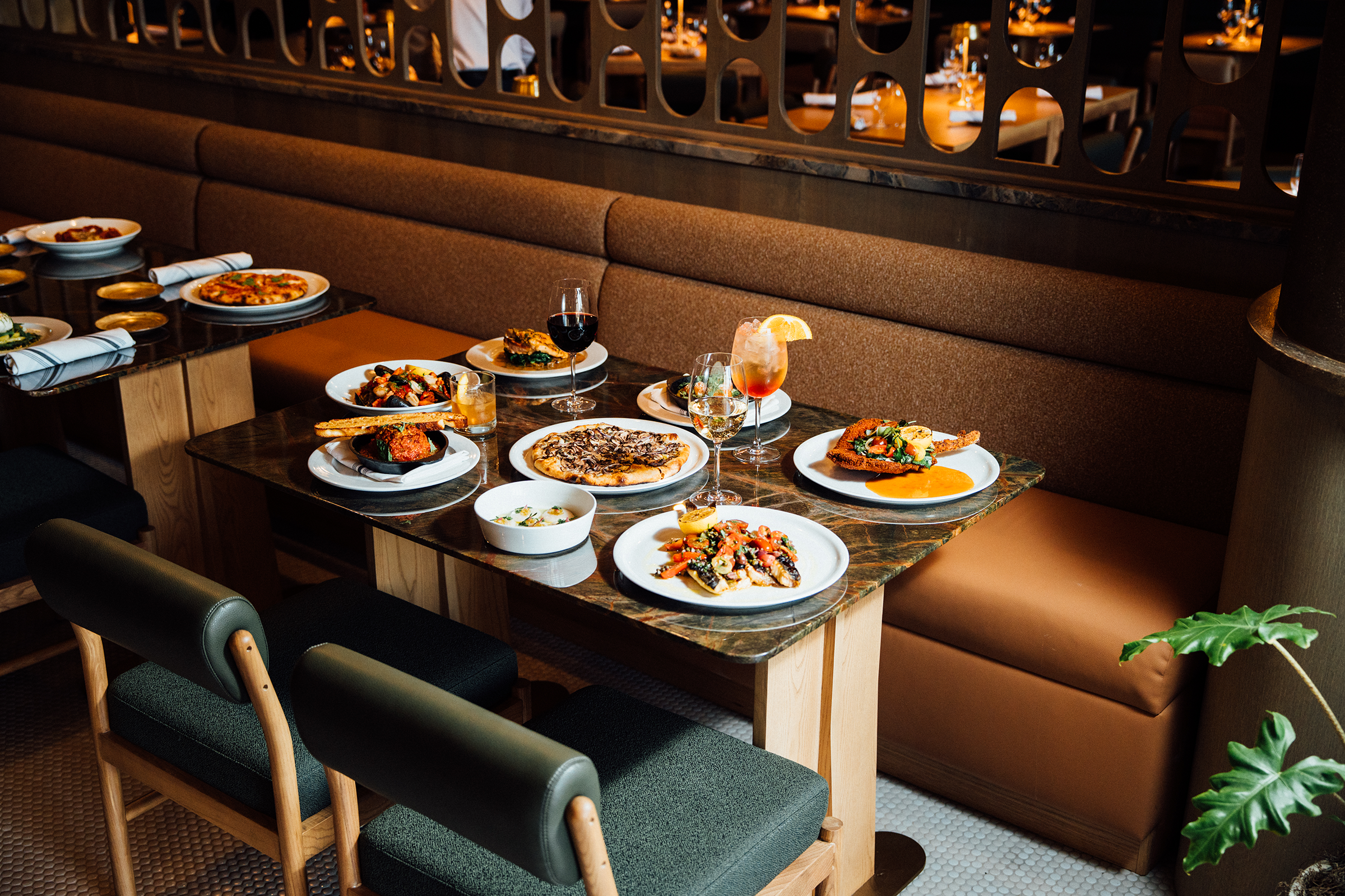 Gino34 table with an array of dishes.