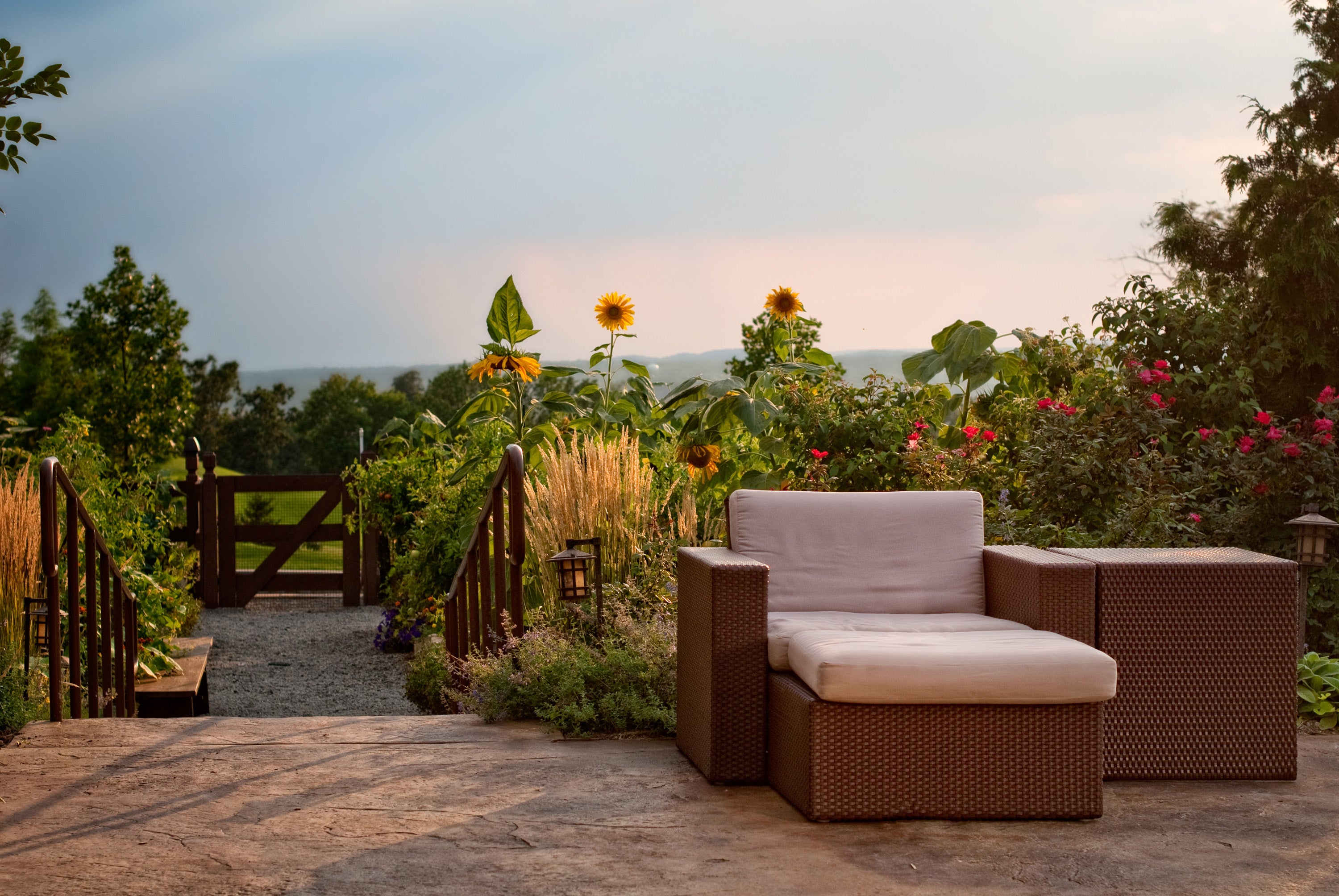 Lounge chair in the floral Chef's Garden at Crystal Springs Resort