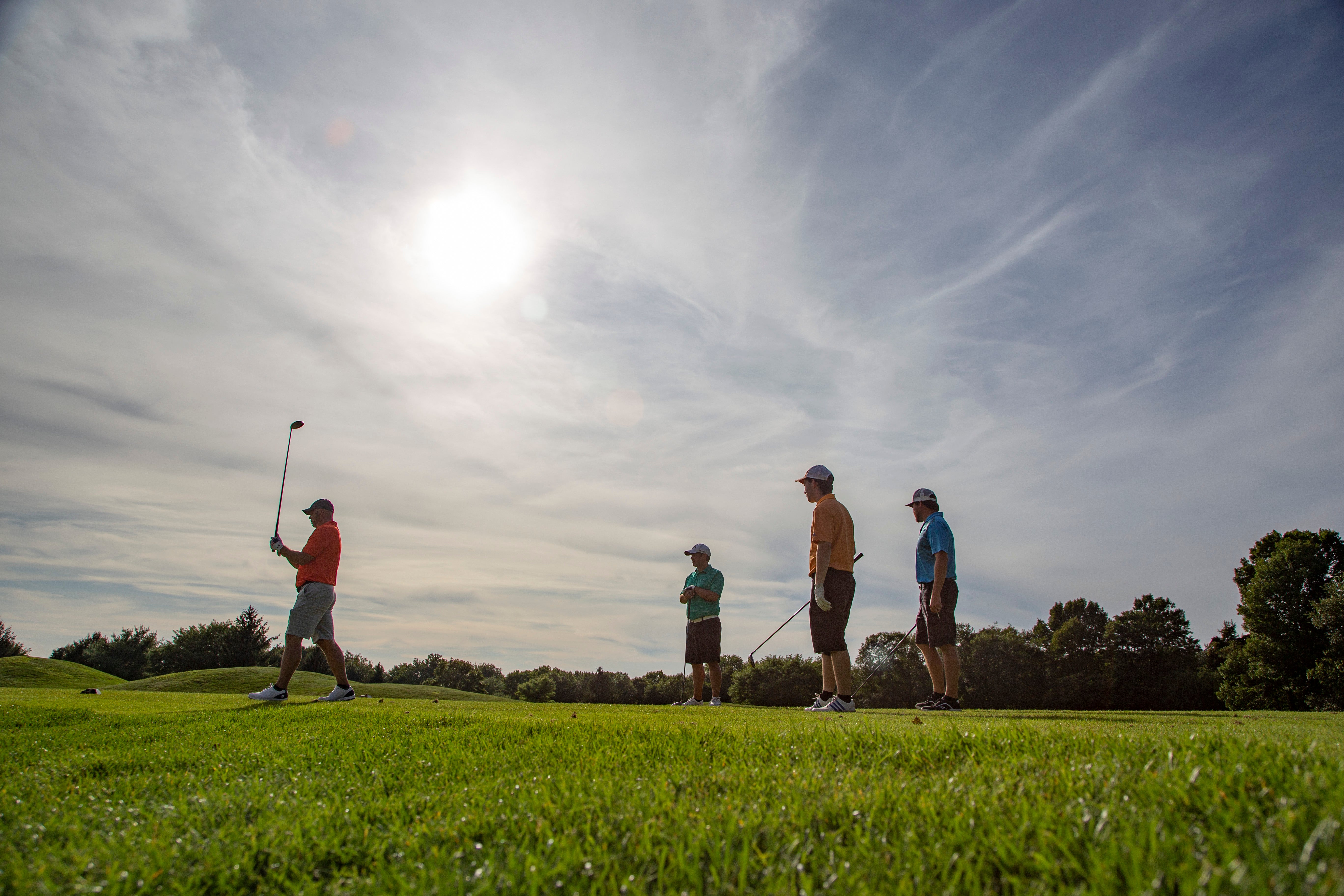Golfers on a course at Crystal Springs Resort