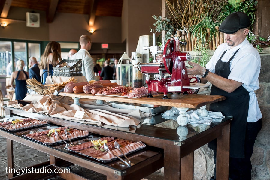 Banquet chef slicing meat for Charcuterie display