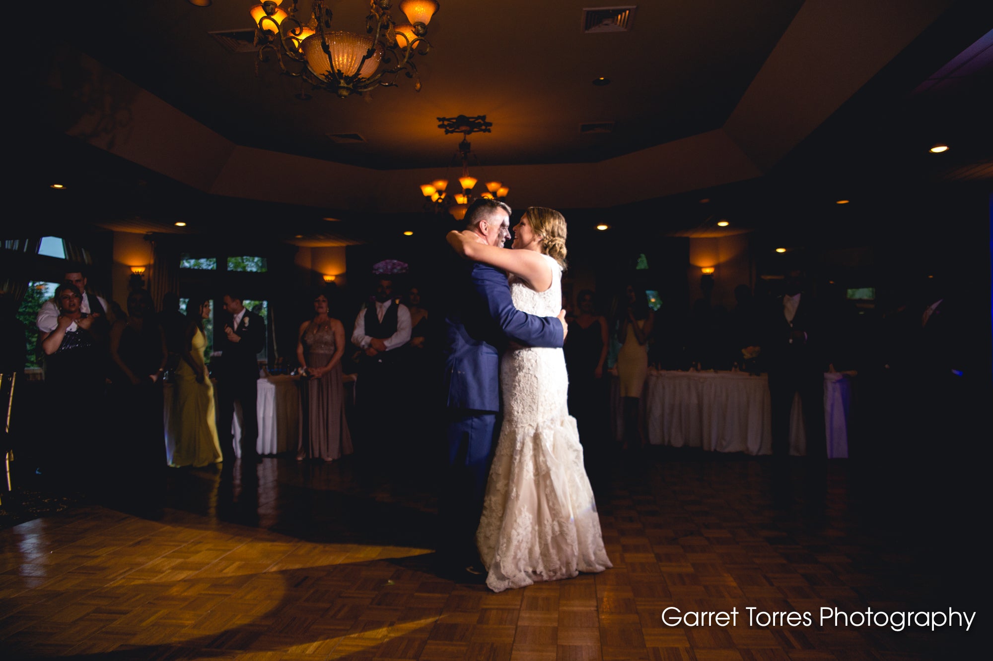Bride and groom dancing during wedding reception at Black Bear Golf Club