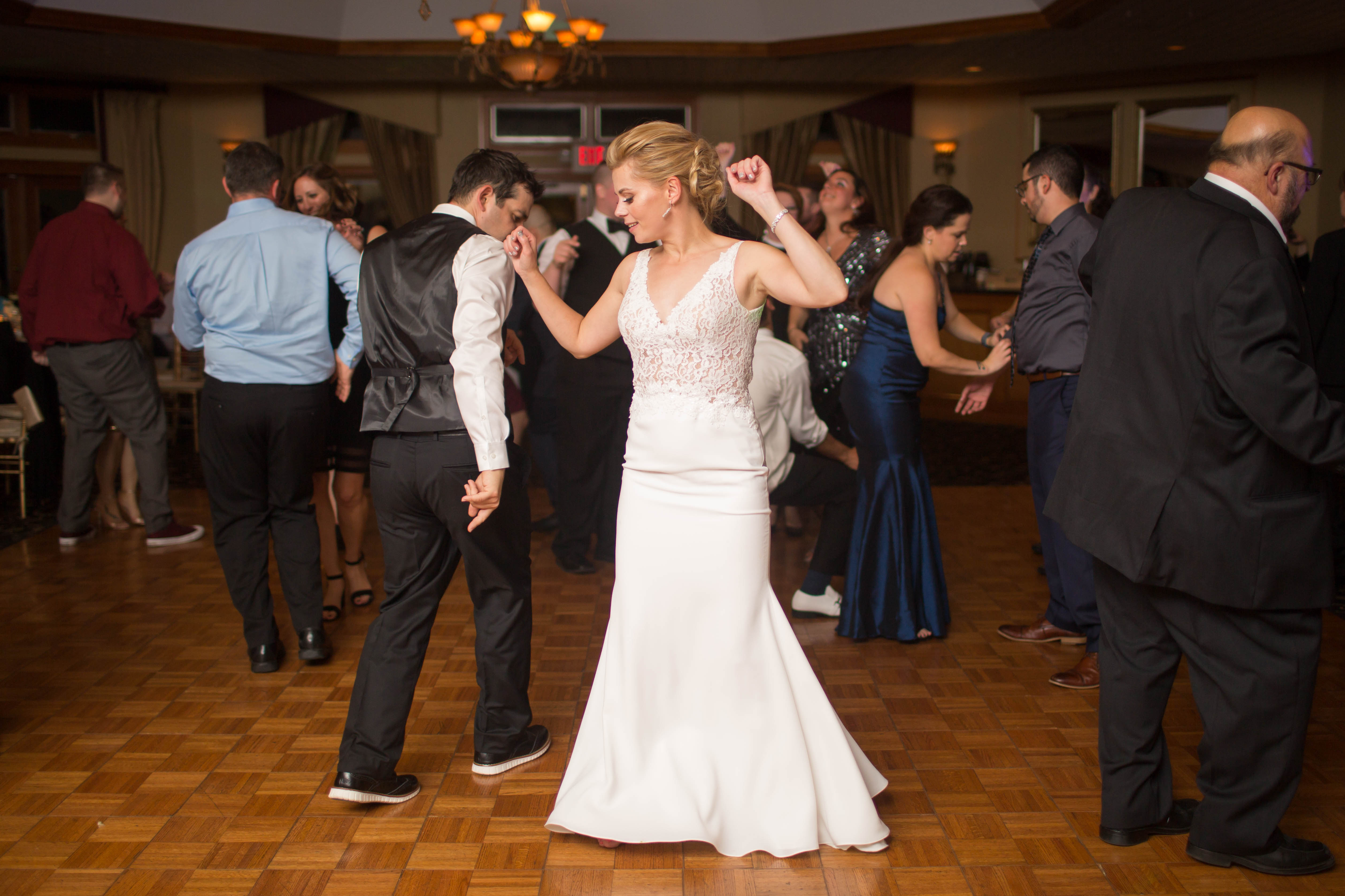 Bride dancing at wedding reception at Black Bear Golf Club