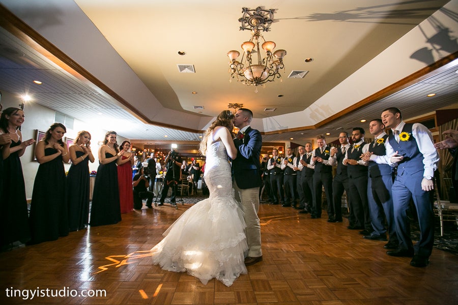 Bride and groom dancing at wedding reception