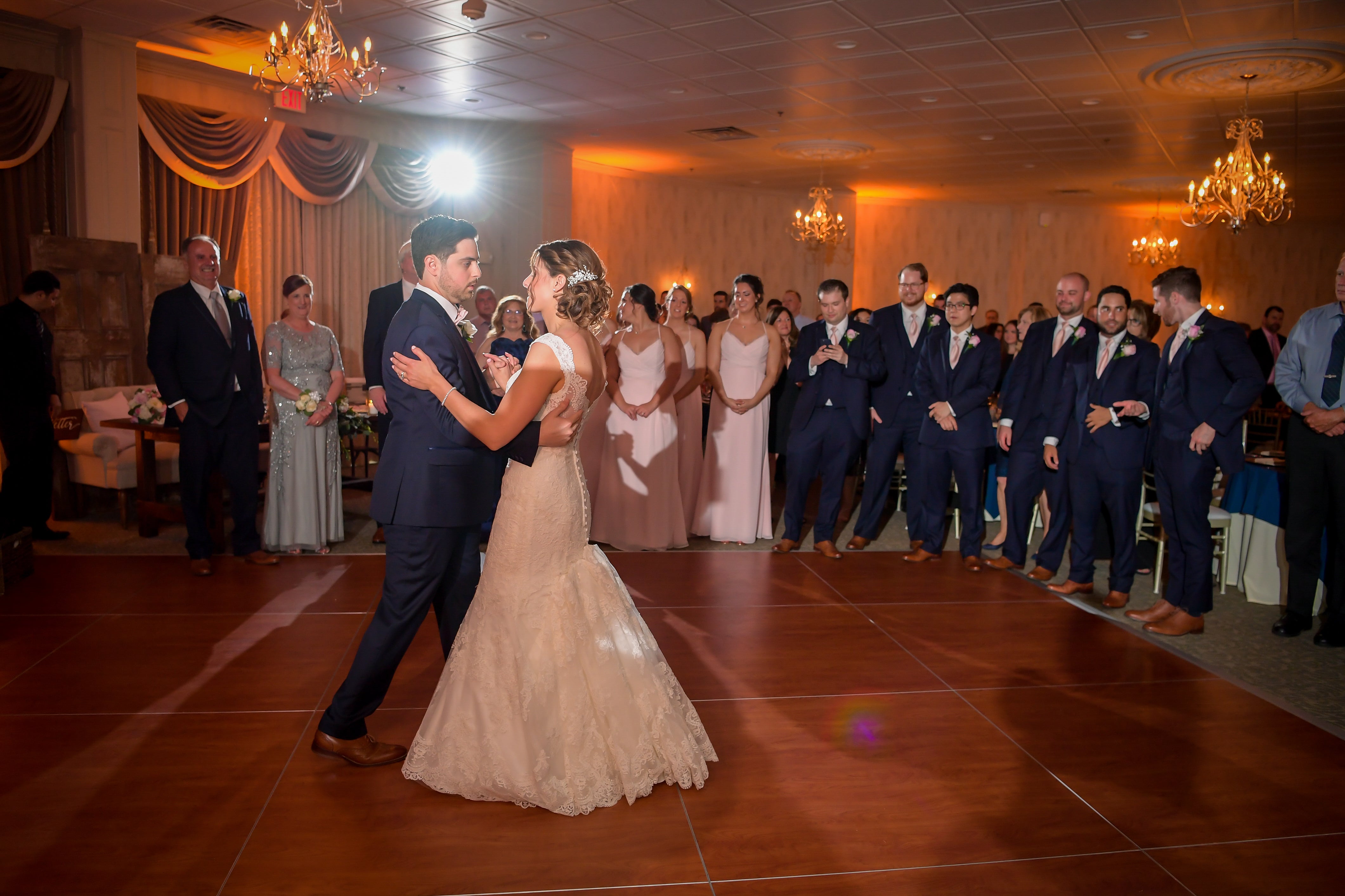 Bride and groom dancing together at wedding