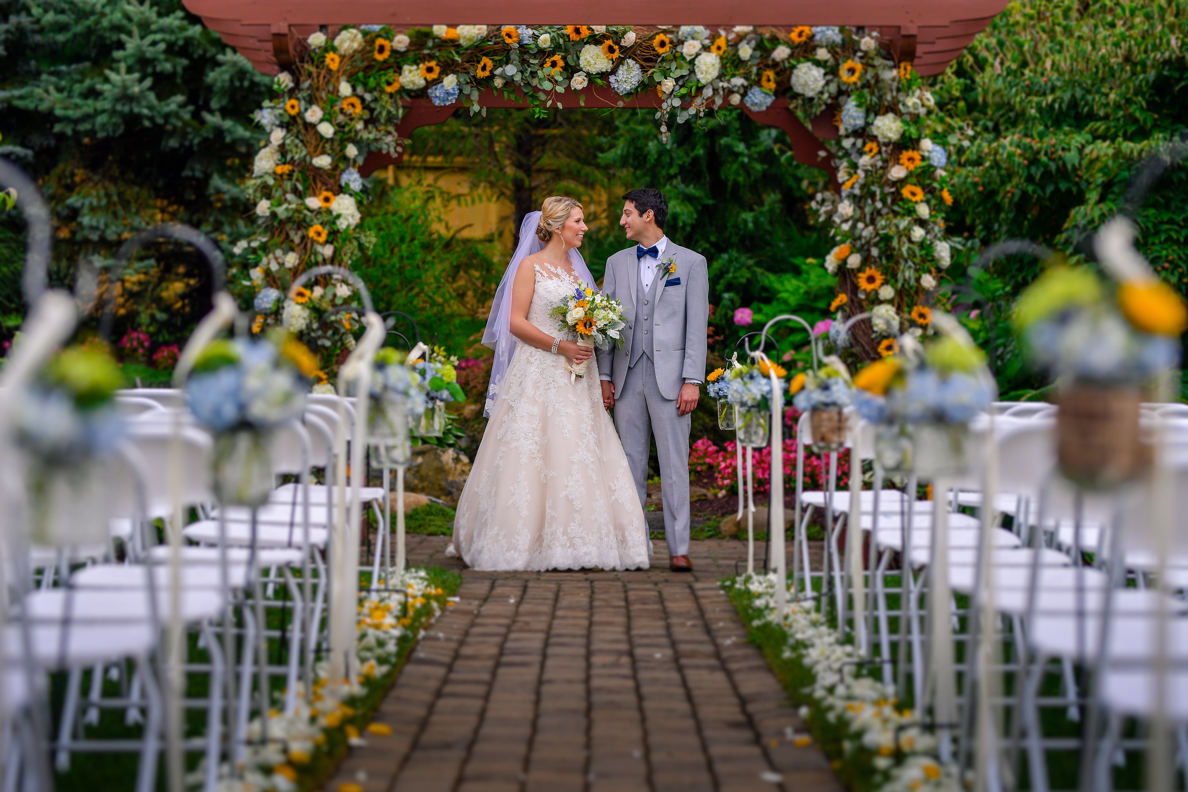 Bride and groom standing at the alter together