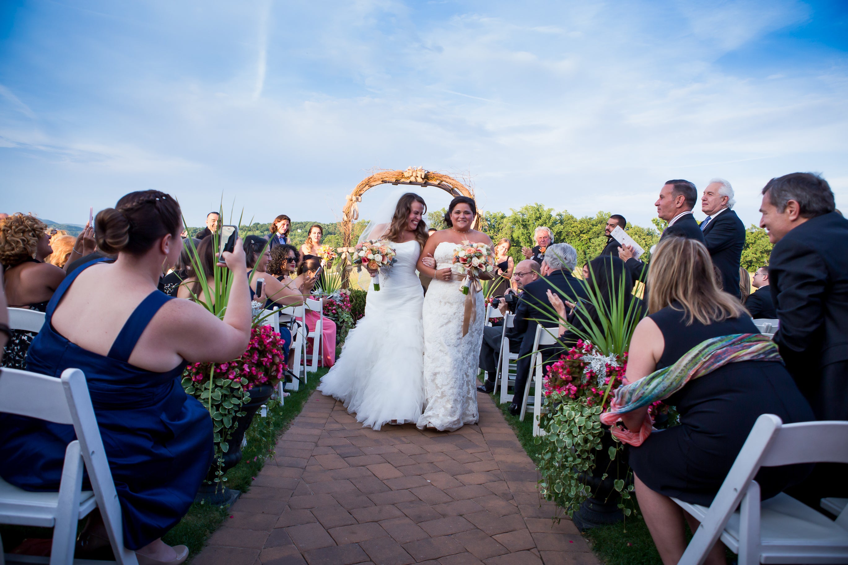 Brides walking down the aisle at Crystal Springs Resort in NJ
