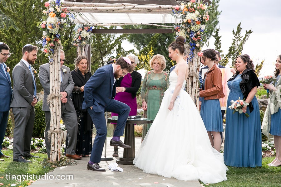 Breaking of the glass at Jewish wedding at Crystal Springs Resort in NJ
