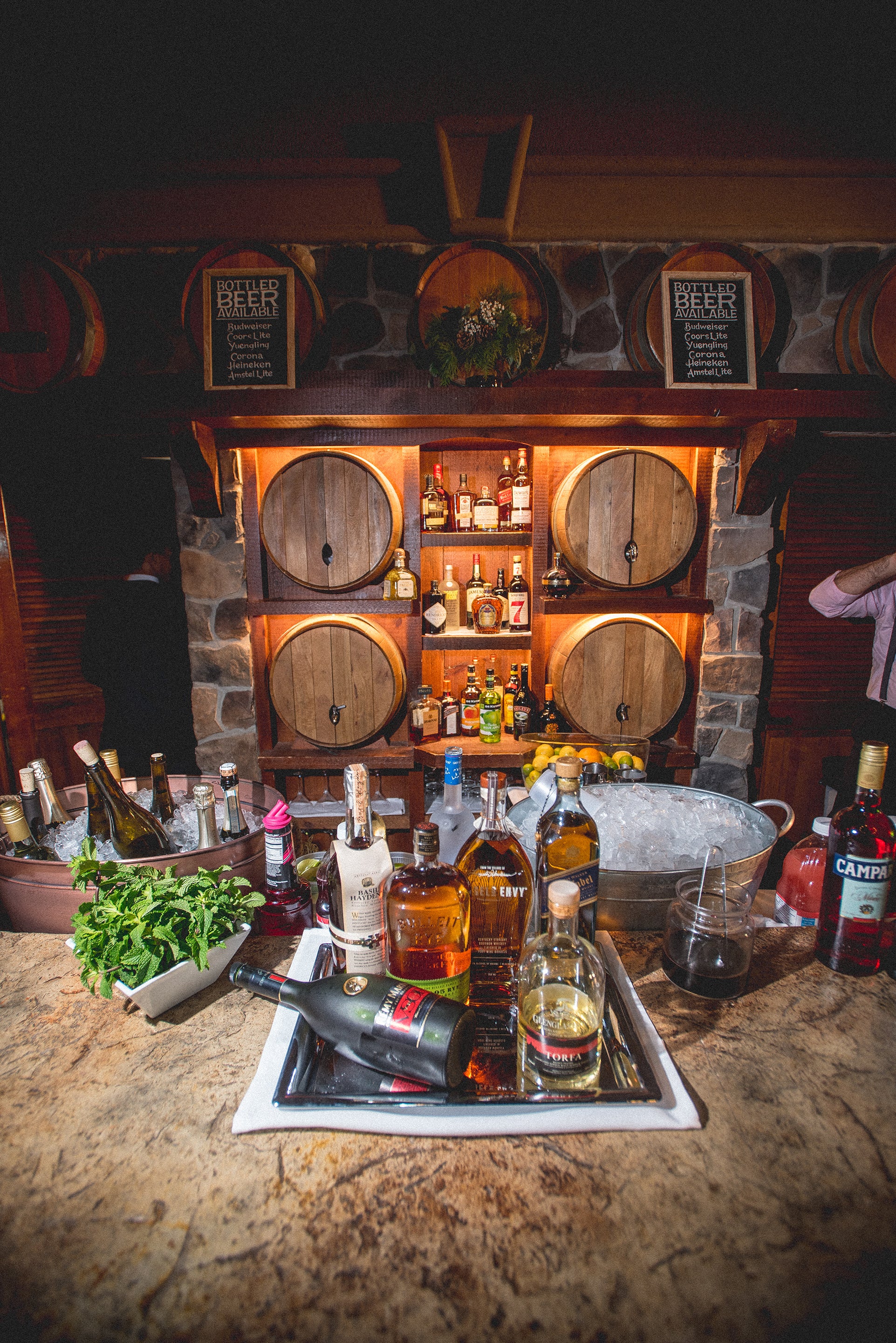 Bar with wooden barrels for kegs.
