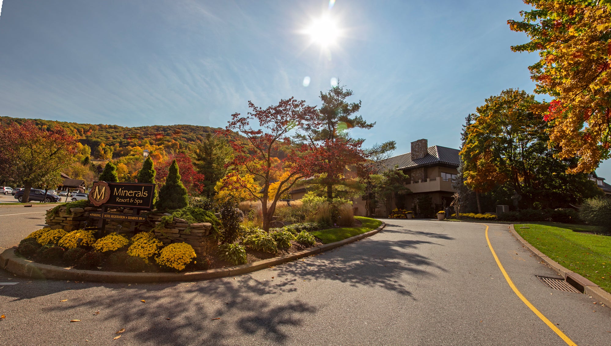 Exterior entrance view of Minerals Hotel during the fall