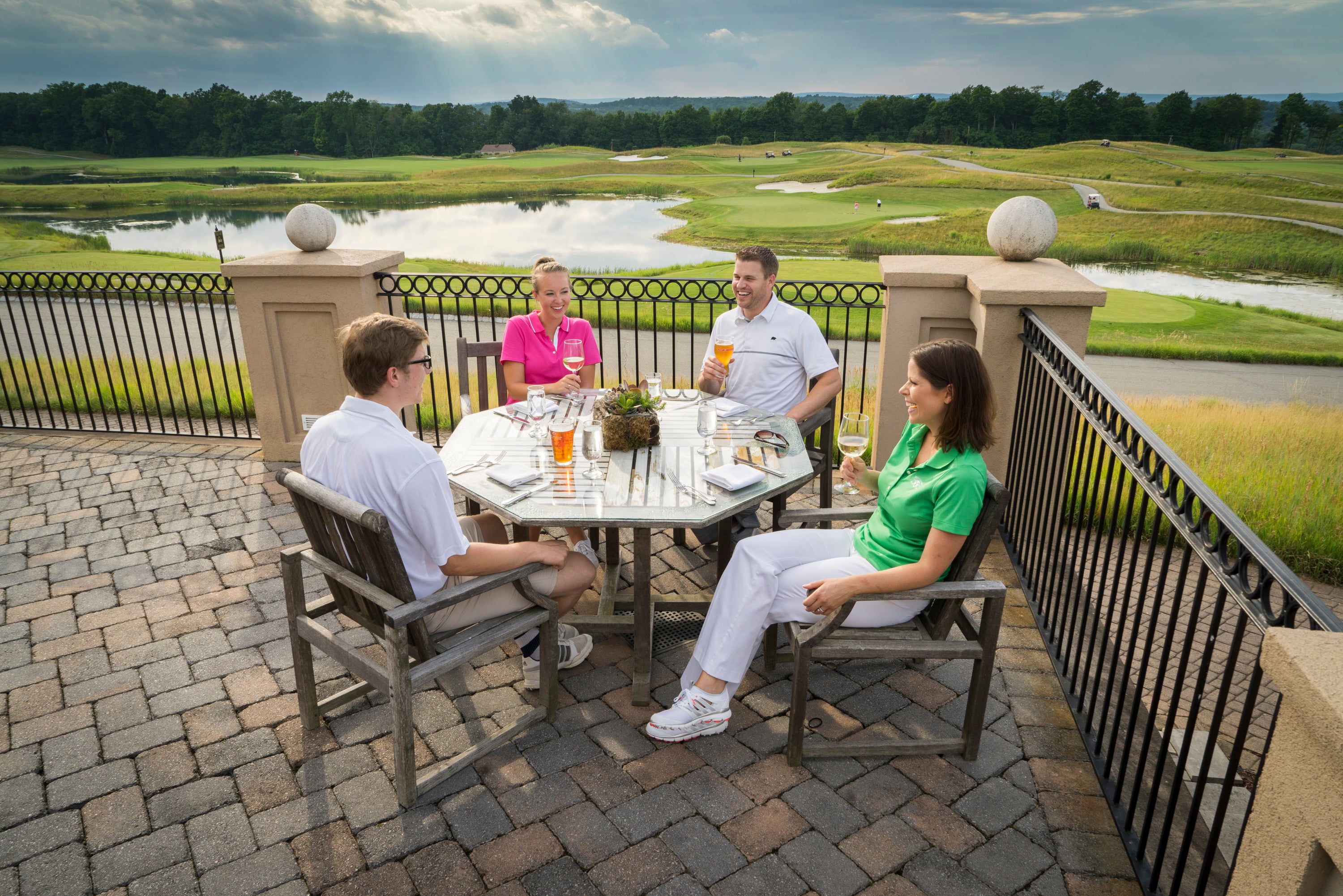 Golfers enjoying a beer at Owen's Pub on Ballyowen golf course