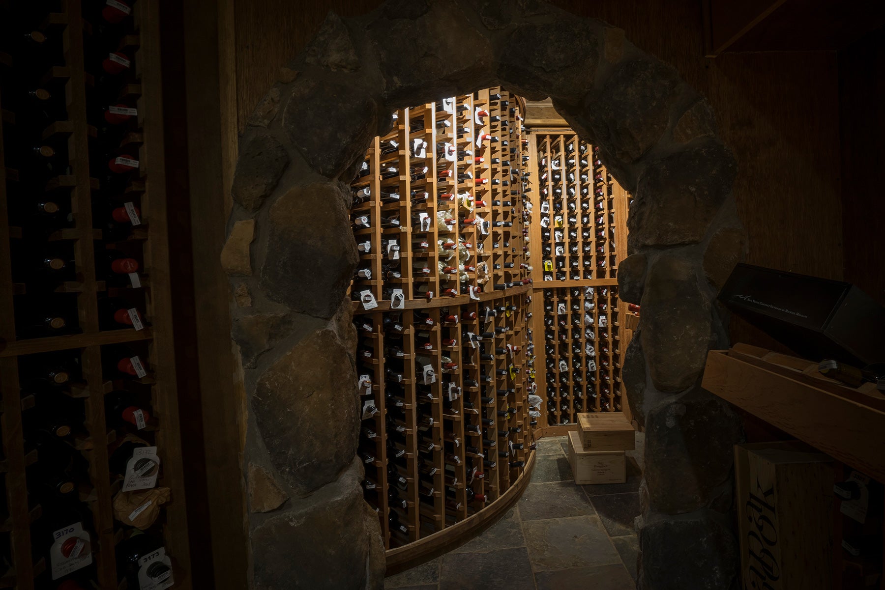 Wine being stored in the walls of the wine cellar. 