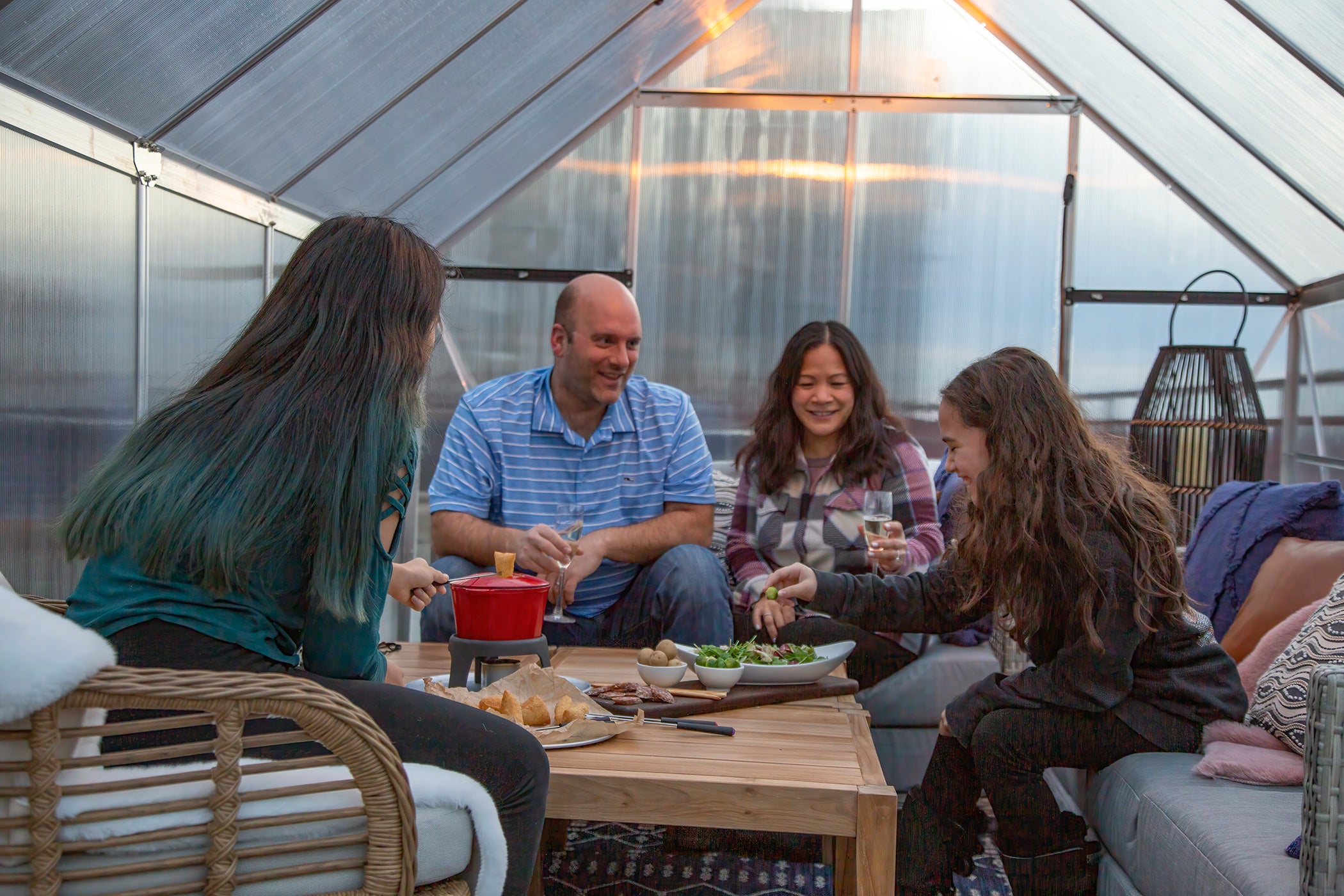 Family of four eating in Champagne Chalet