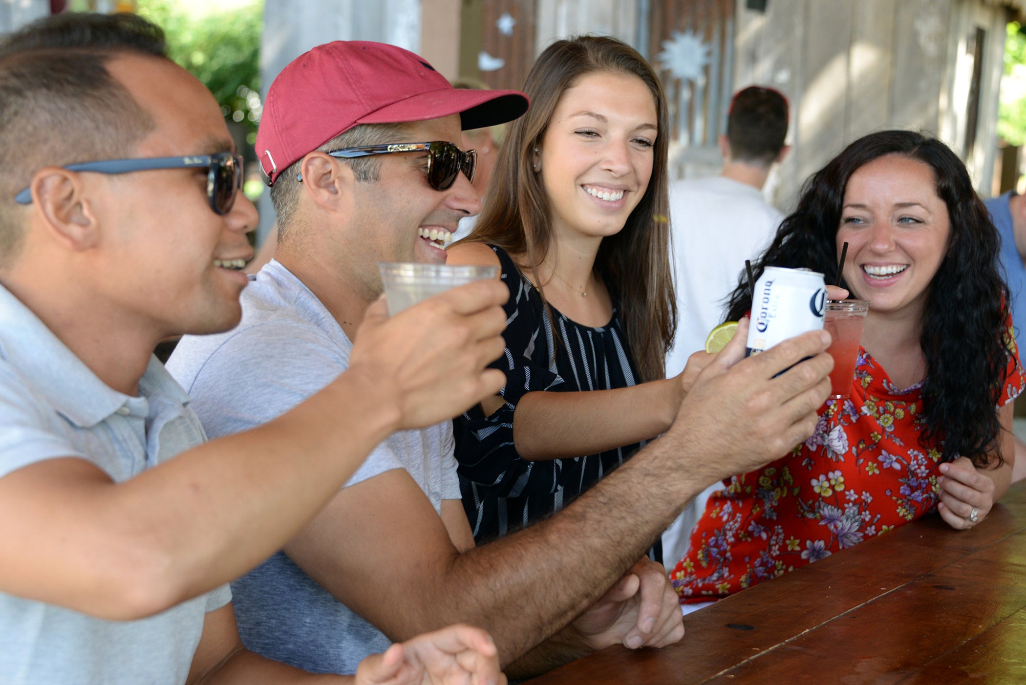 Friends toasting drinks at Moonshine Bar