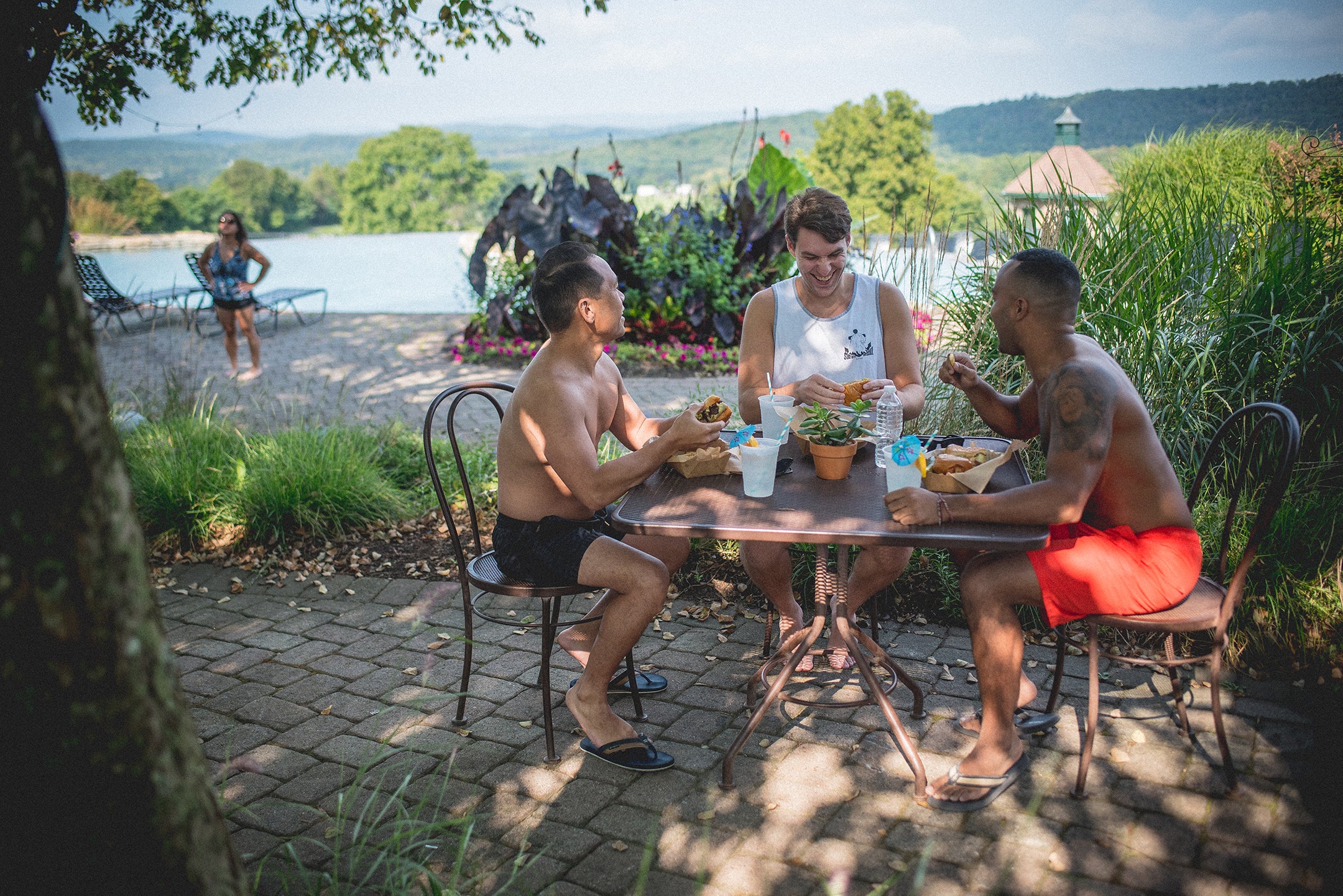 Guys sipping cocktails at the Vista 180 Cafe