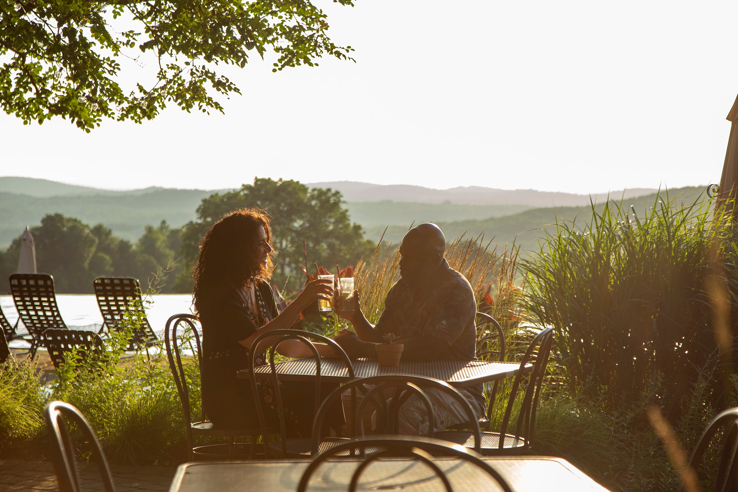 Couple enjoying cocktails at the Vista 180 Cafe at Crystal Springs Resort