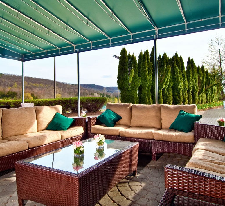 Outdoor seating at Bear Den Grille at Black Bear Golf Club in NJ