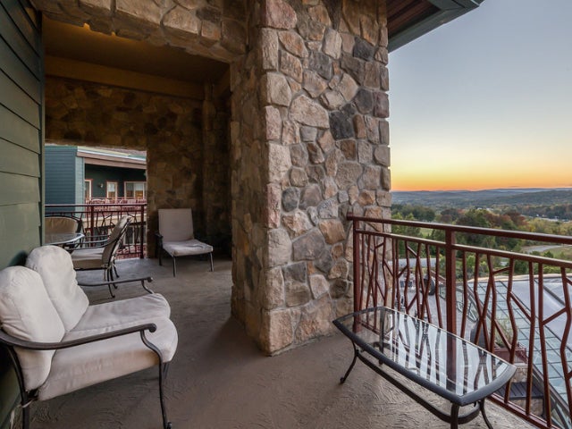 Guest Room Balcony Sunset View at Grand Cascades Lodge in NJ