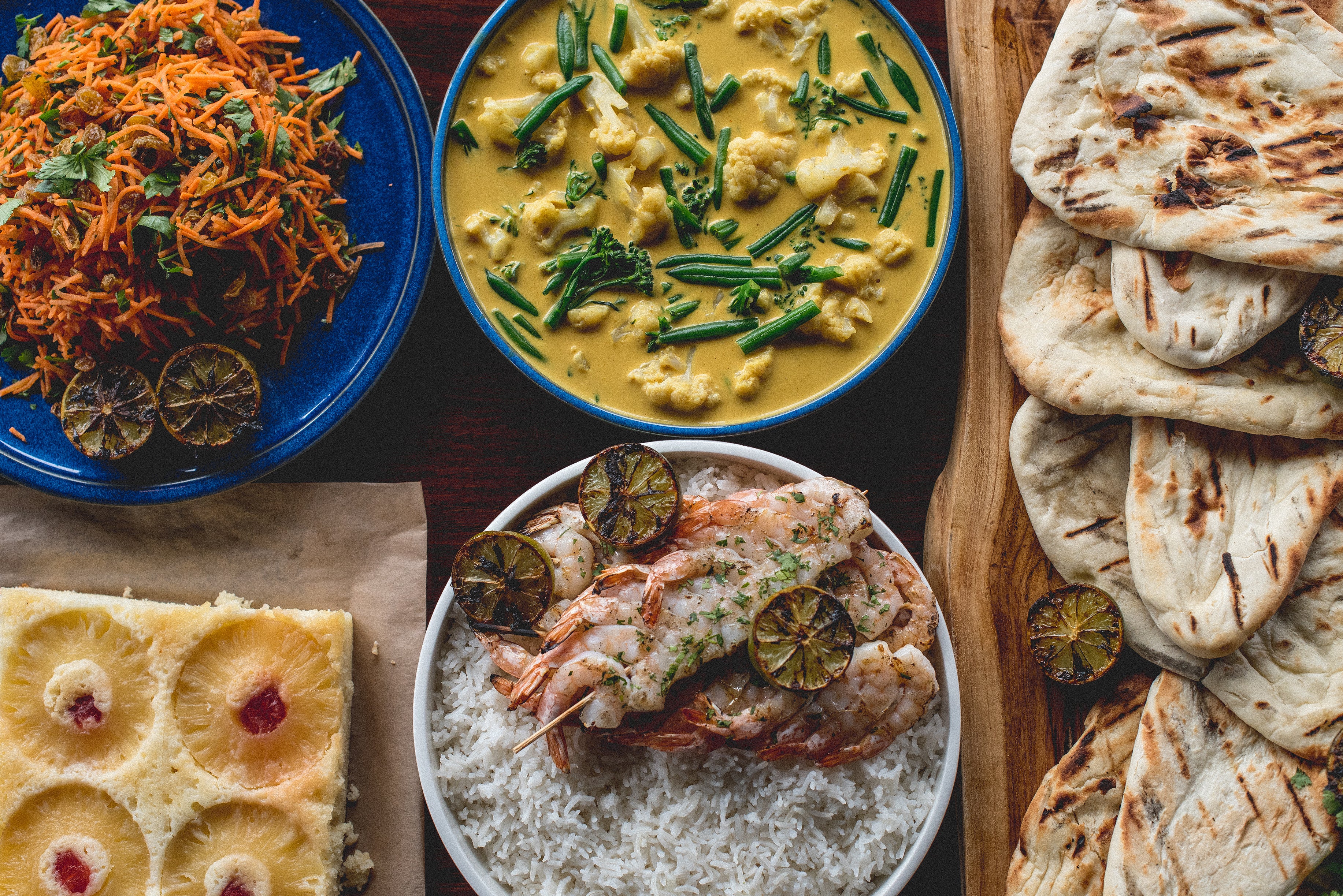Curry, naan bread, rice and shrimp.