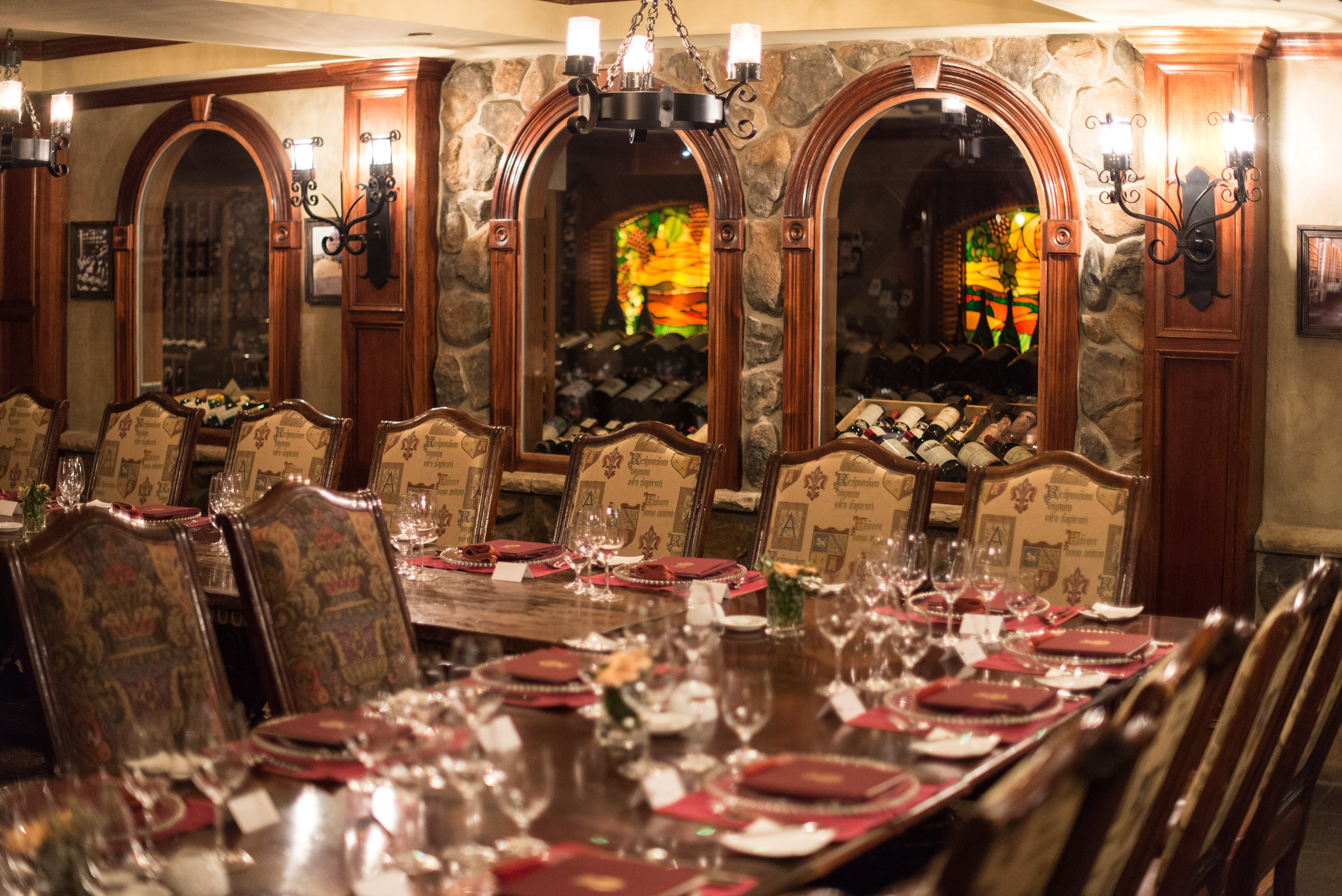 Wine Cellar Bordeaux Room set up long wooden dinner tables.