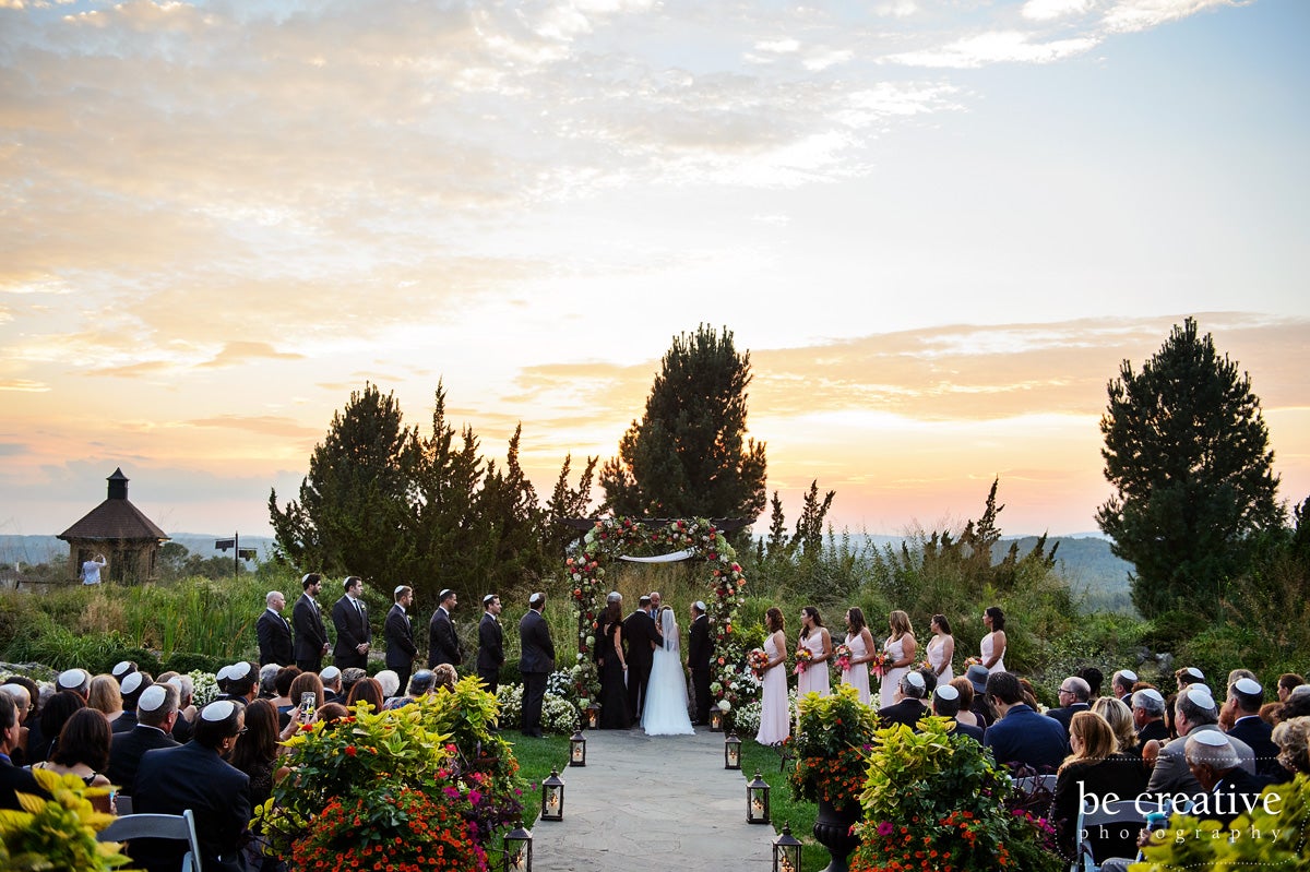 Jewish wedding ceremony at sunset