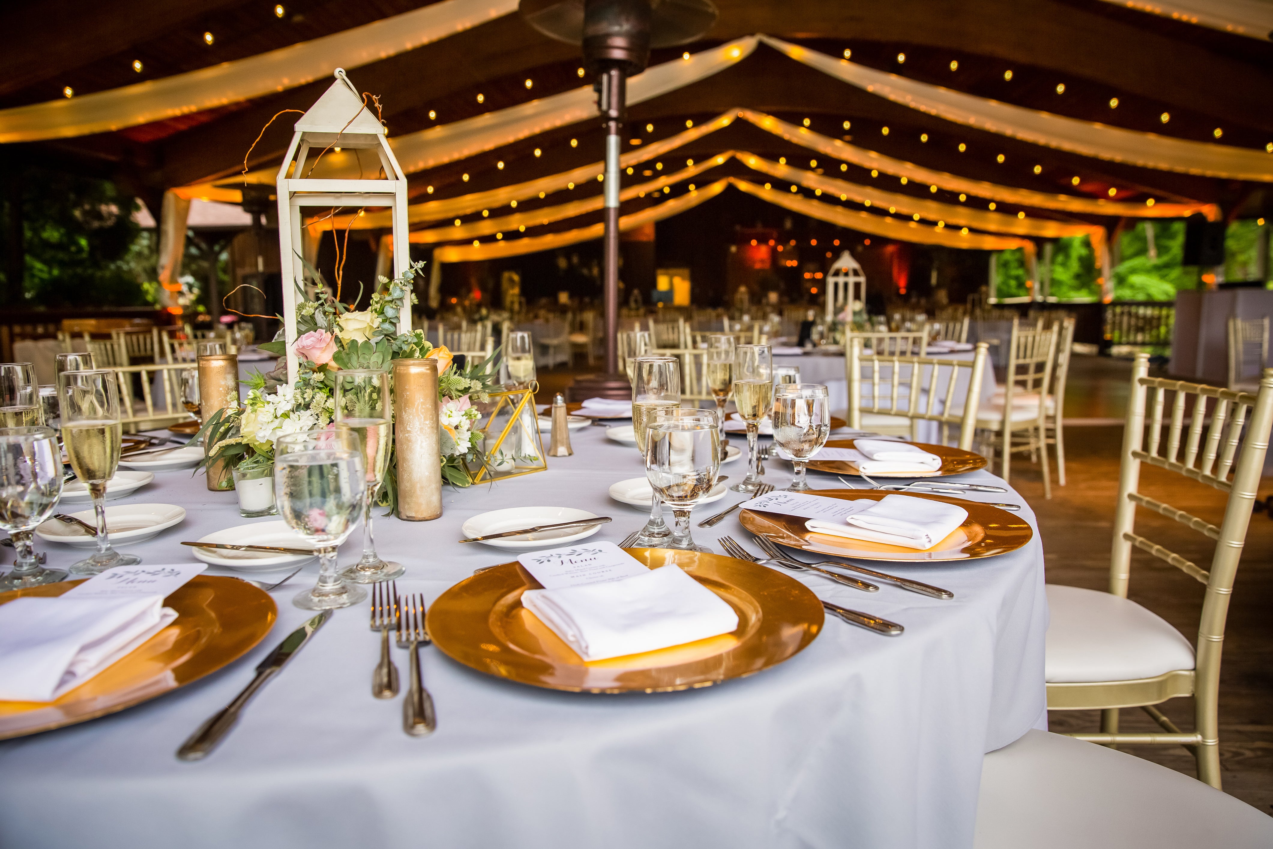 Table set for wedding reception in Sweetgrass Pavillion