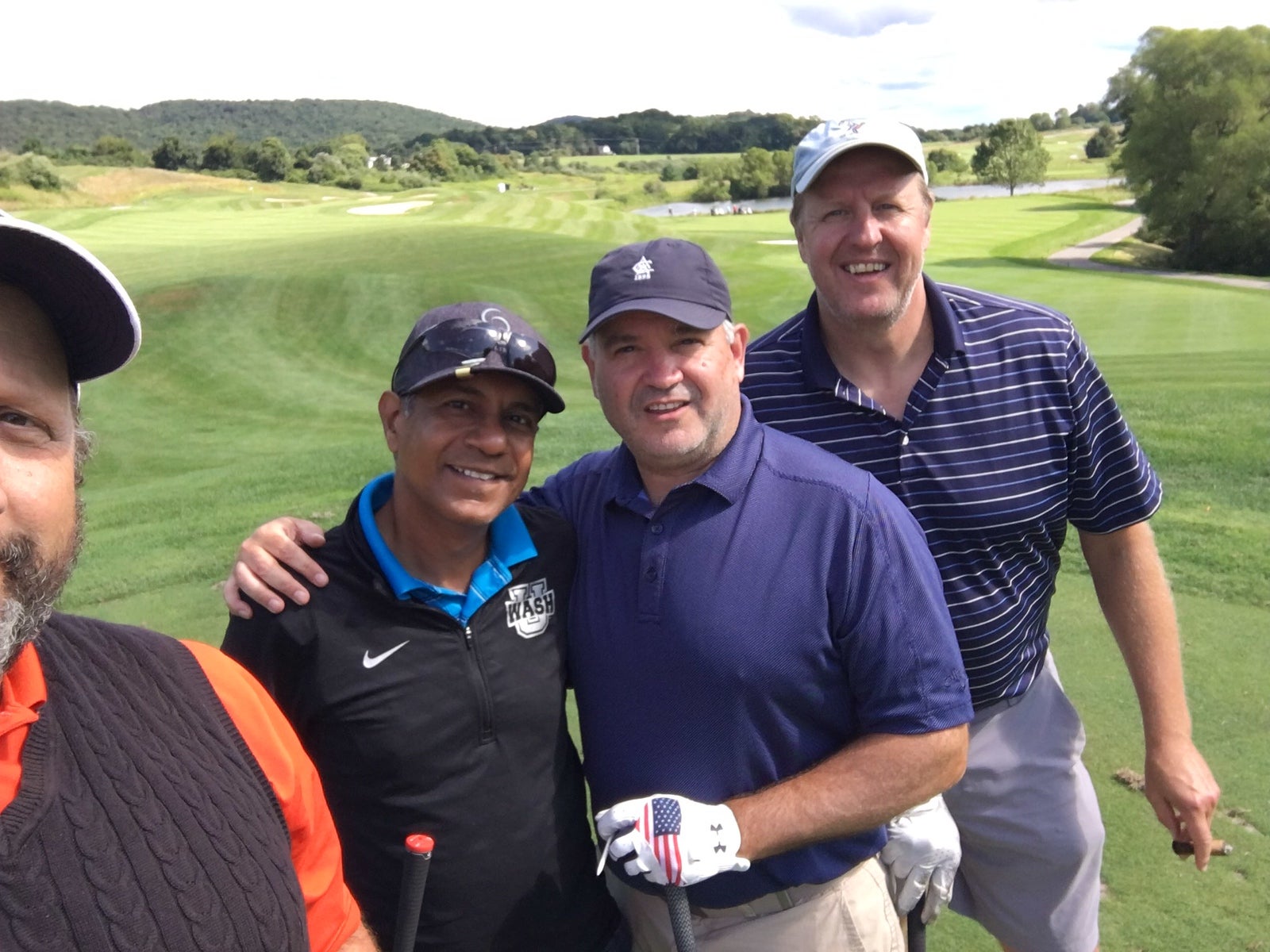 Guys having a good time on a golf course at Crystal Springs Resort