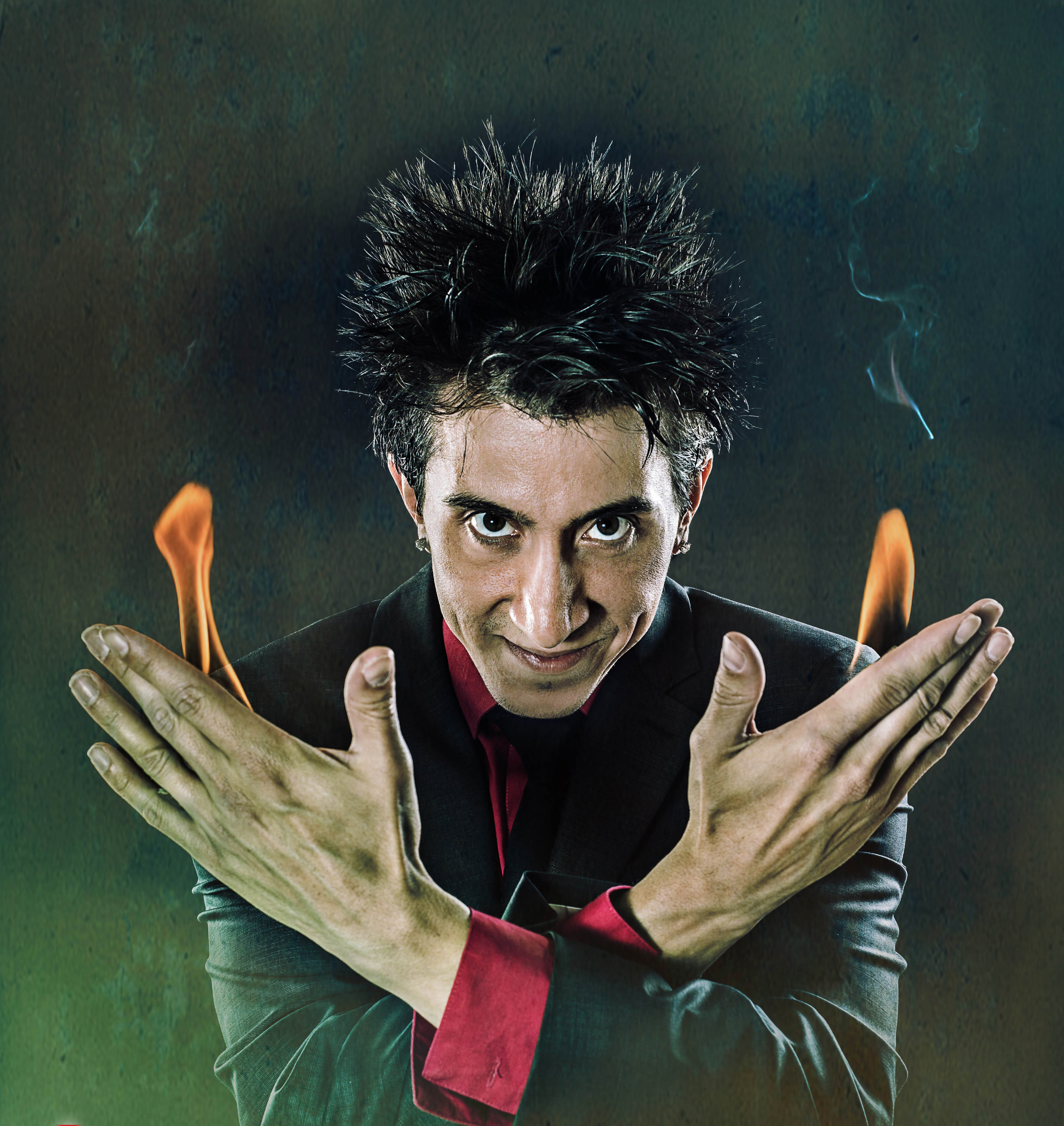 Jay Mattioli with fire coming out of hands.