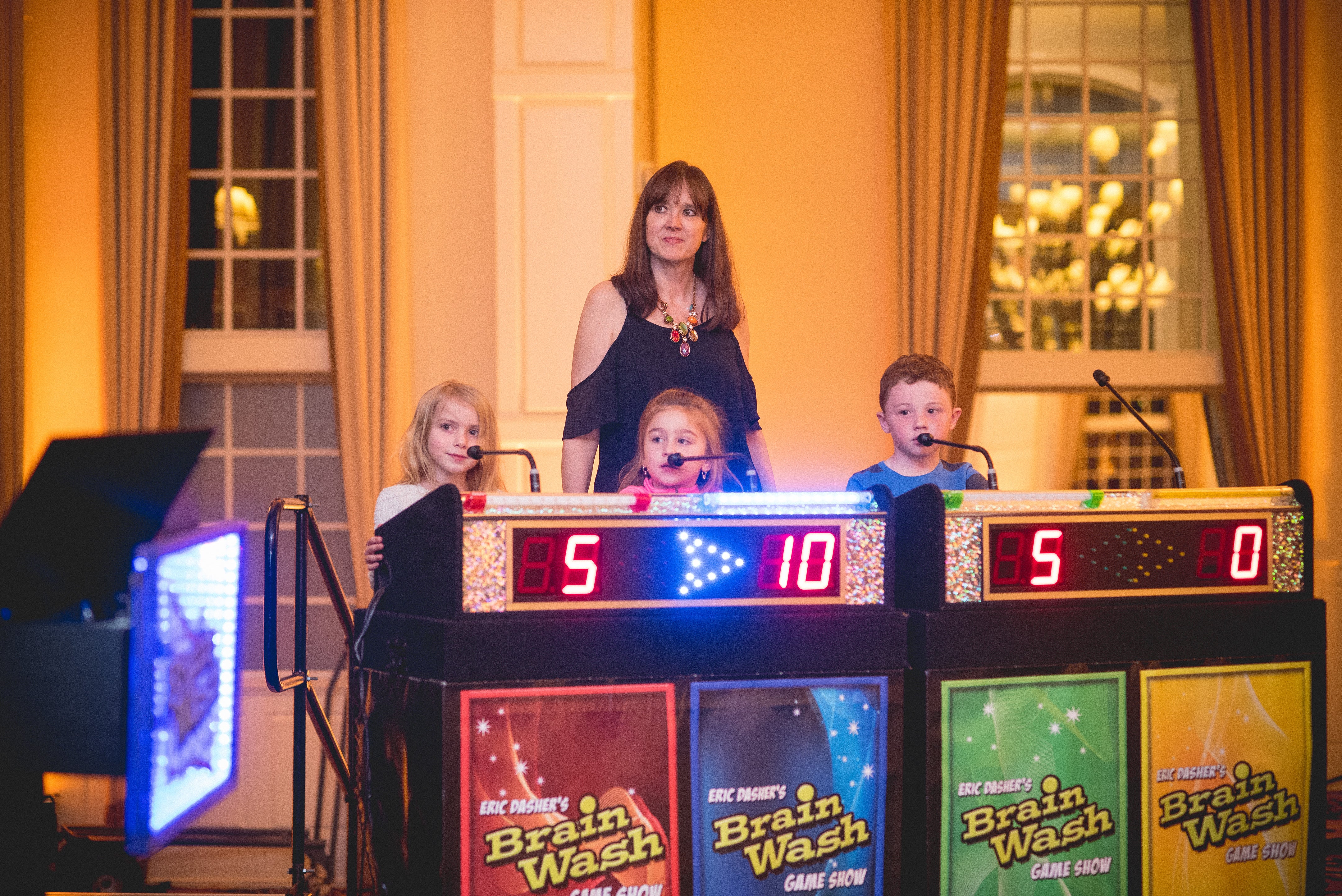 Group participating in brain wash game show.