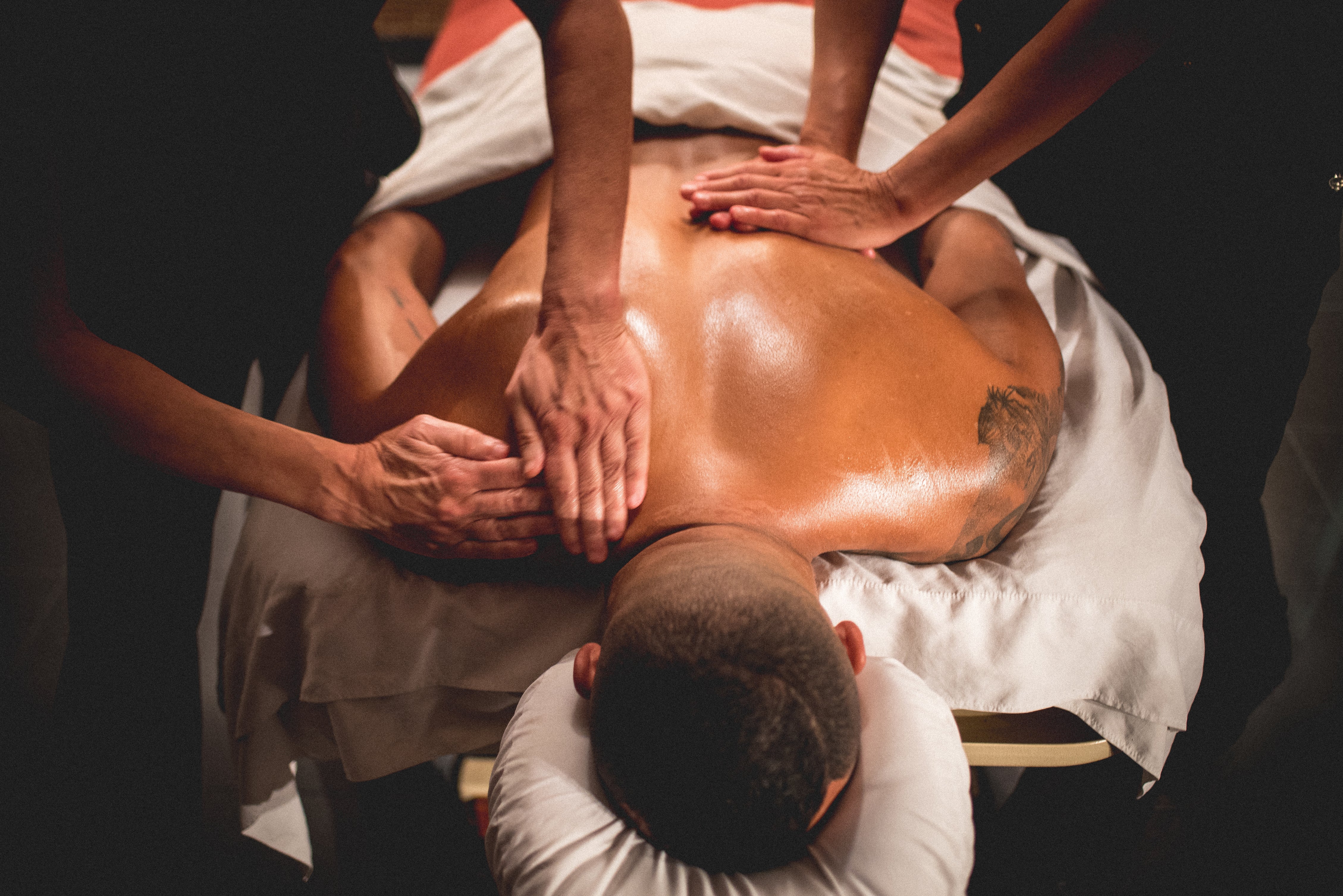 Guest receiving back massage.