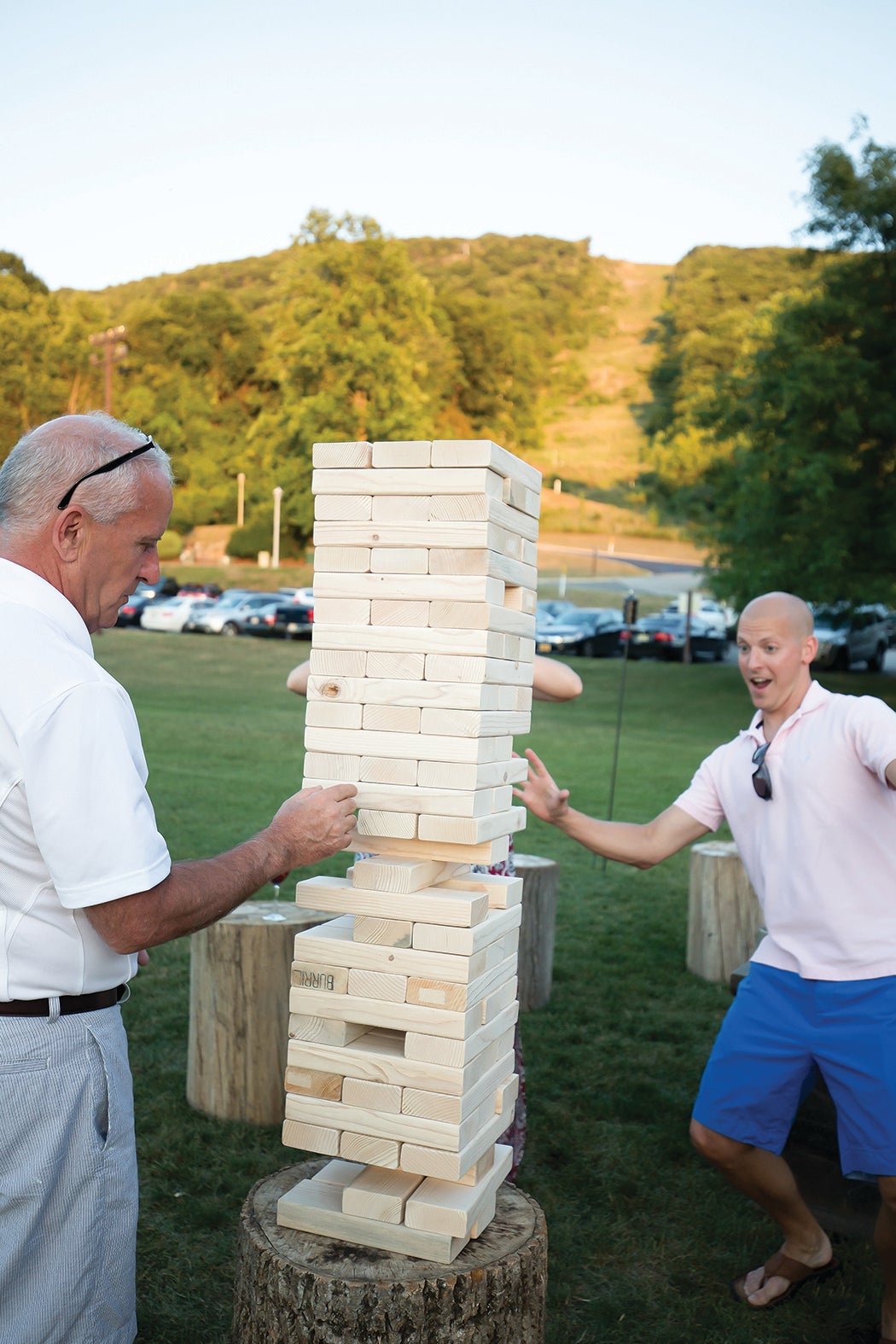 A couple of guys playing Jenga