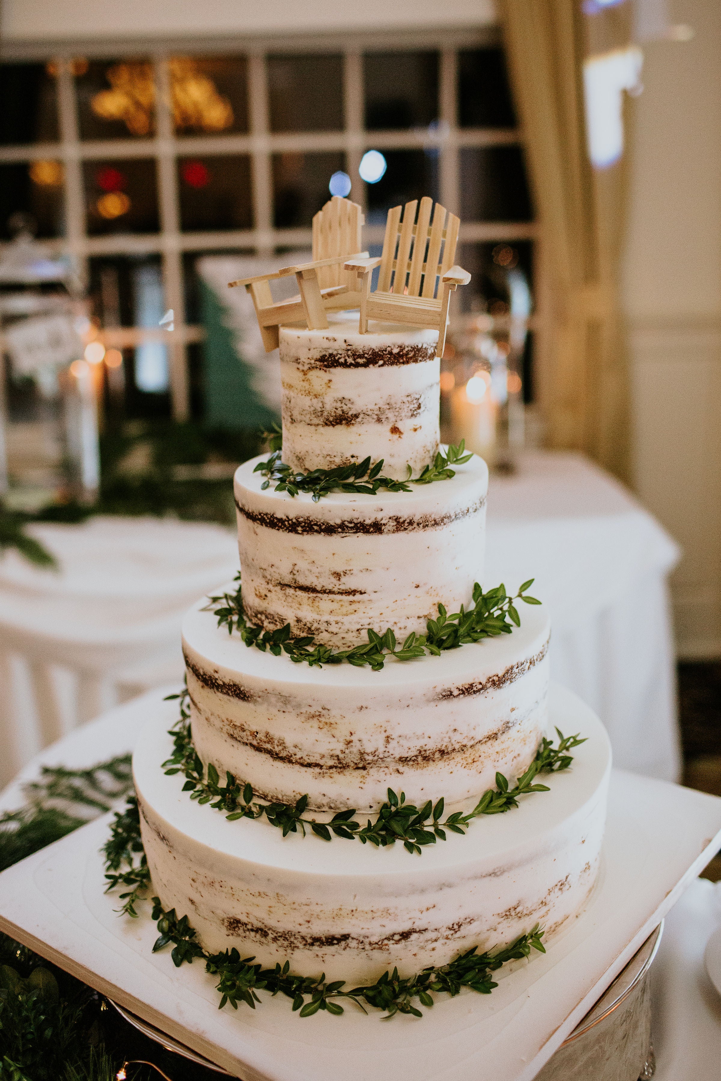 Wedding cake with two beach chairs on top