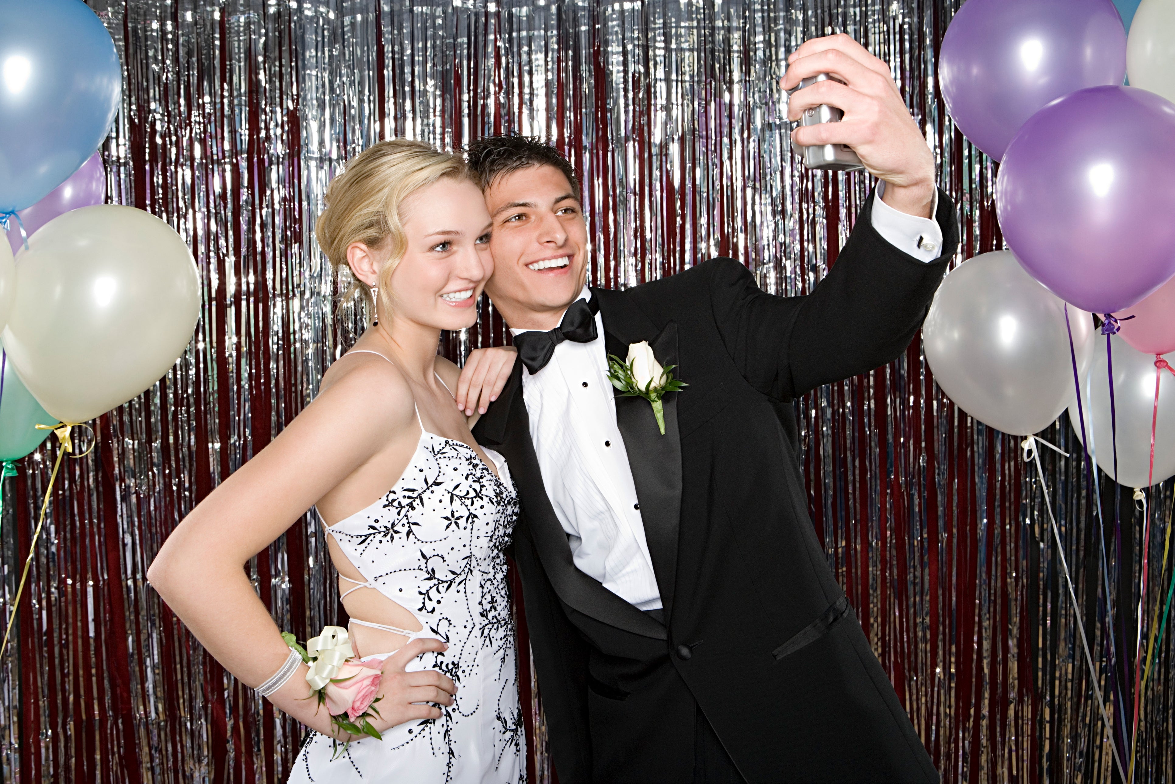 Couple Taking Selfie at Prom