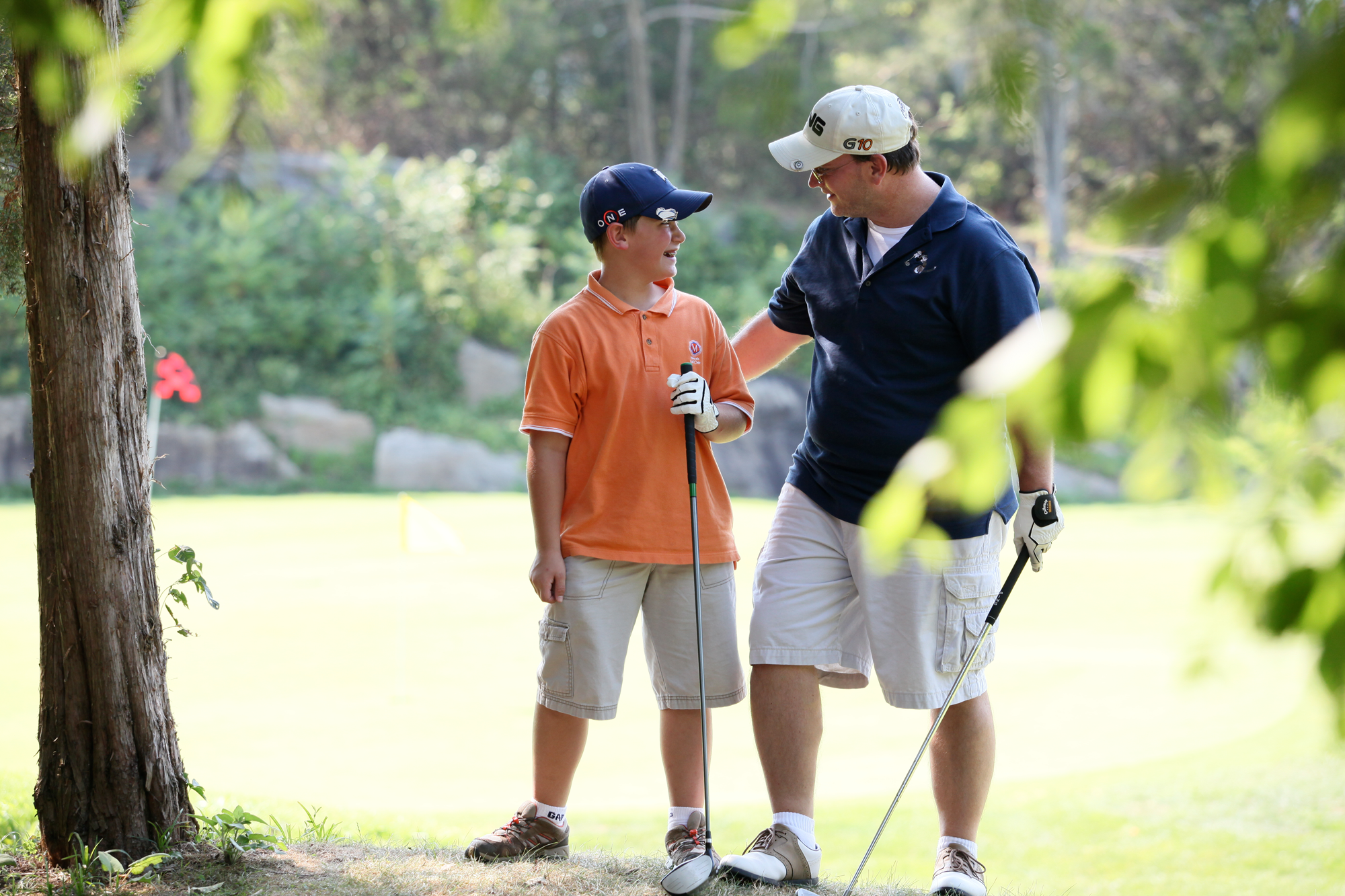 Father and son on a golf course at Crystal Springs Resort