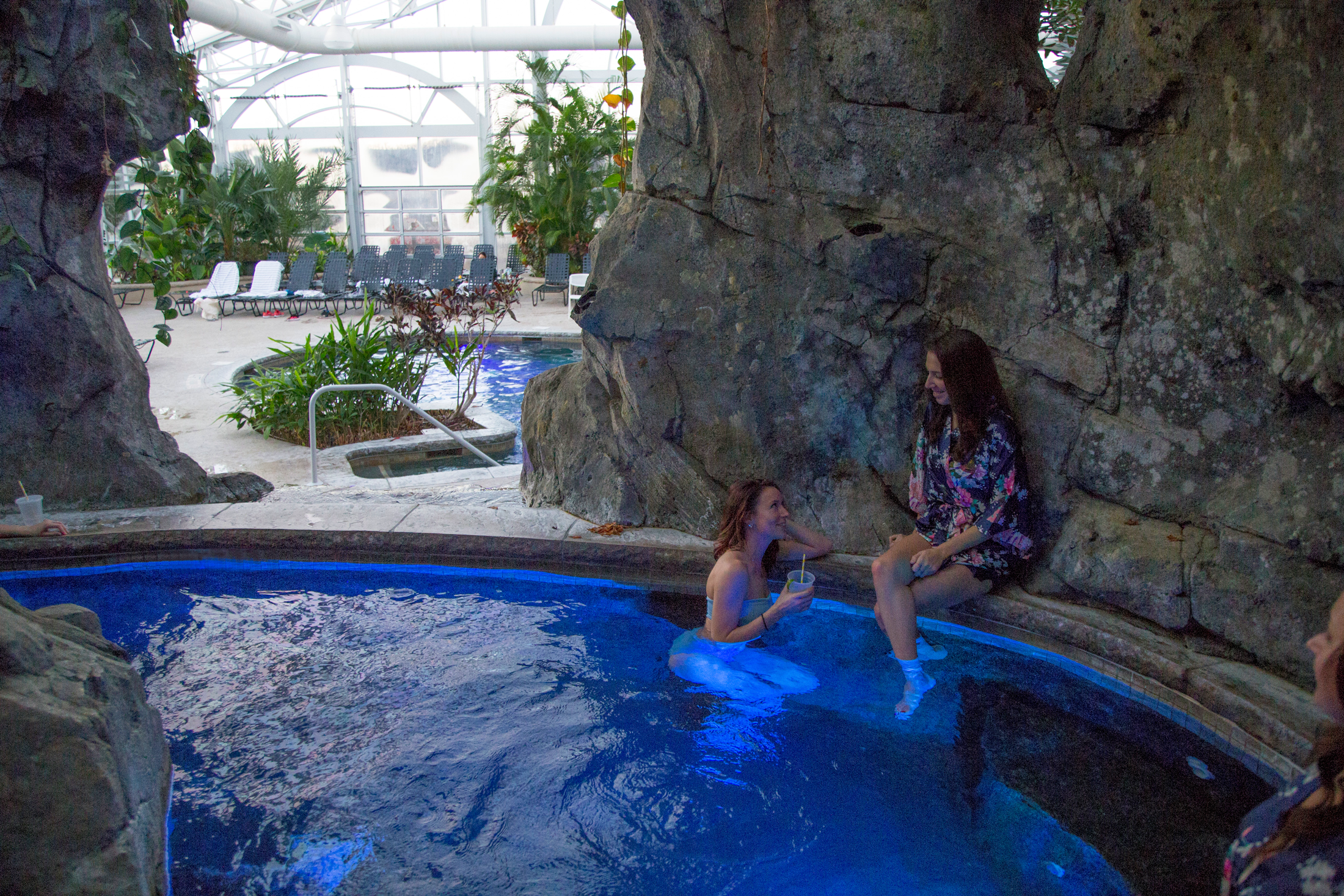 Two women in biosphere hot tub.