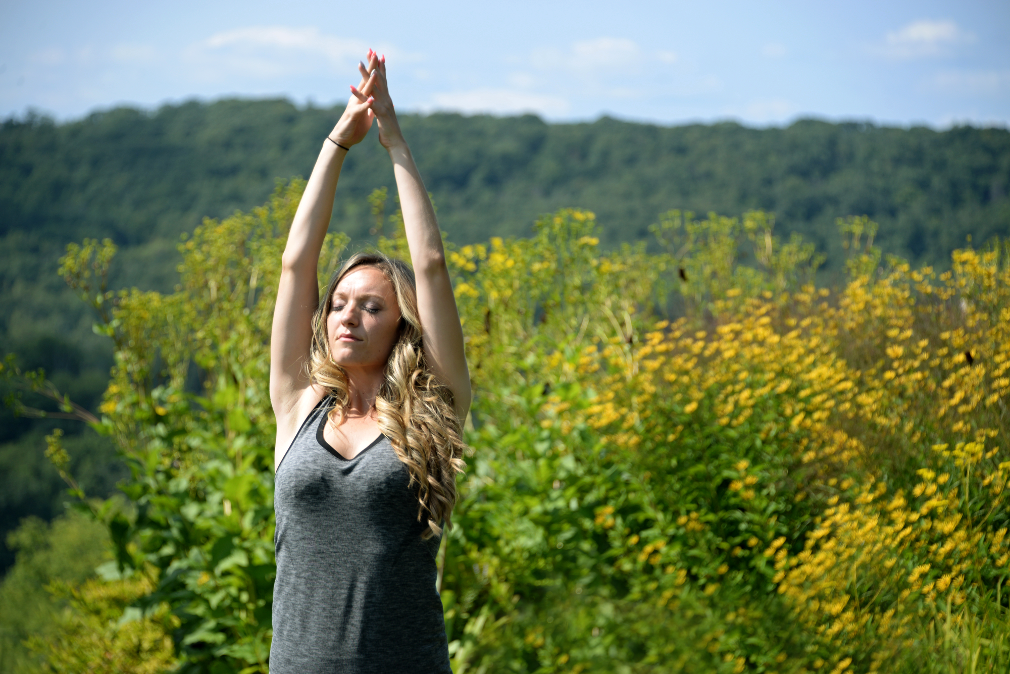 Woman doing Yoga Pose Outdoors