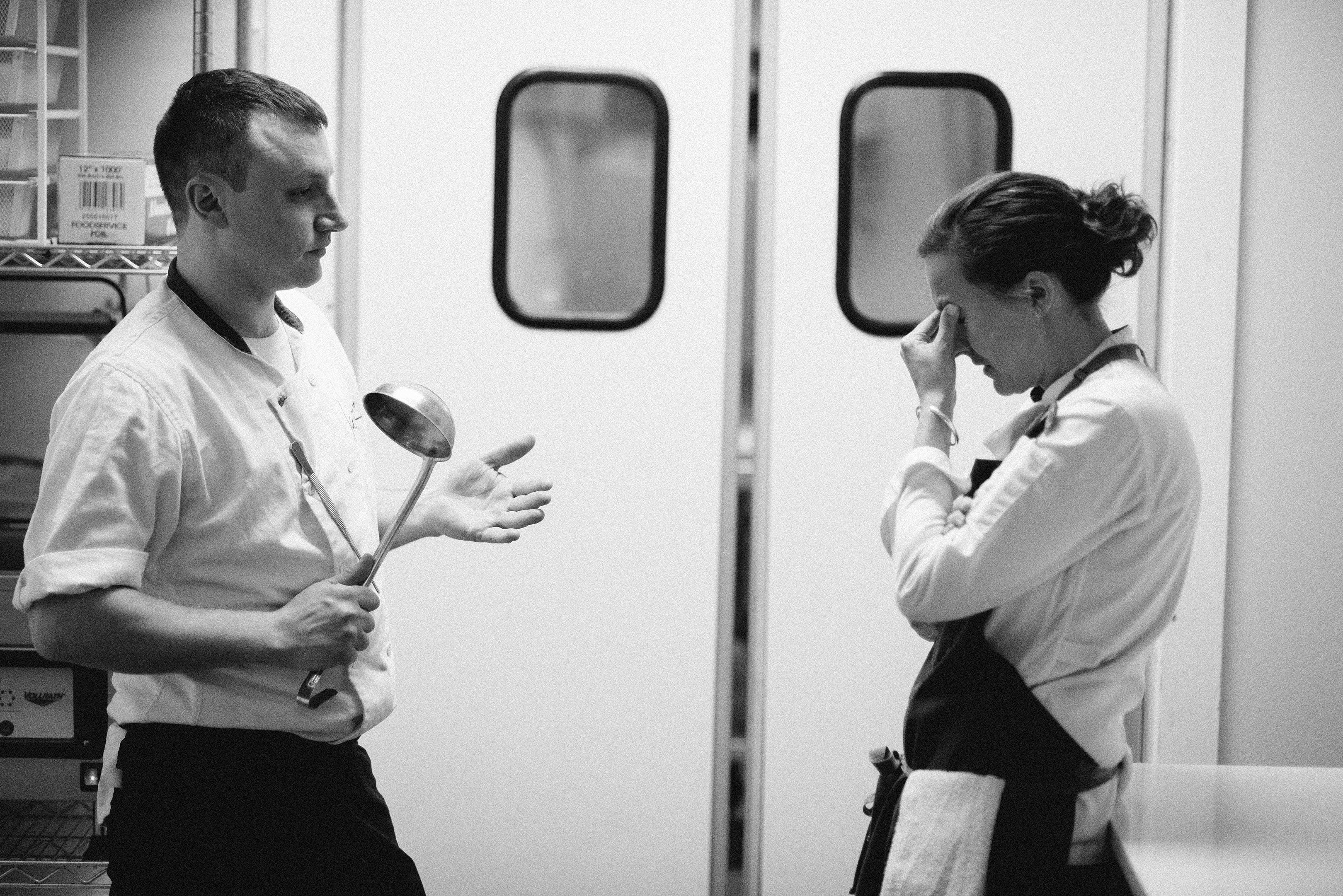 Chefs Speaking in the Kitchen